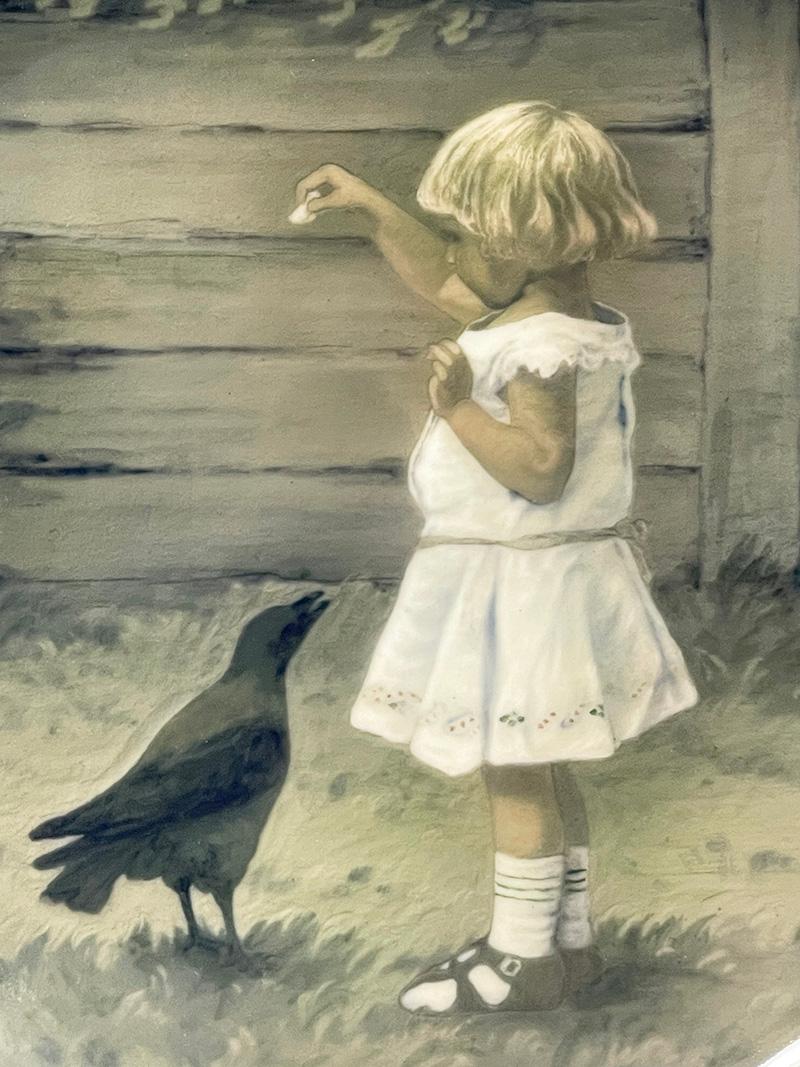 Einzigartiger Wandteller aus Porzellan von Bing & Grøndahl, Dänemark 1902-1914

Wandteller mit der Szene eines Mädchens, das einen Vogel in einem eingezäunten Garten füttert, gemalt auf einem Porzellanteller von Bing & Grøndahl, Dänemark 1902-1914,