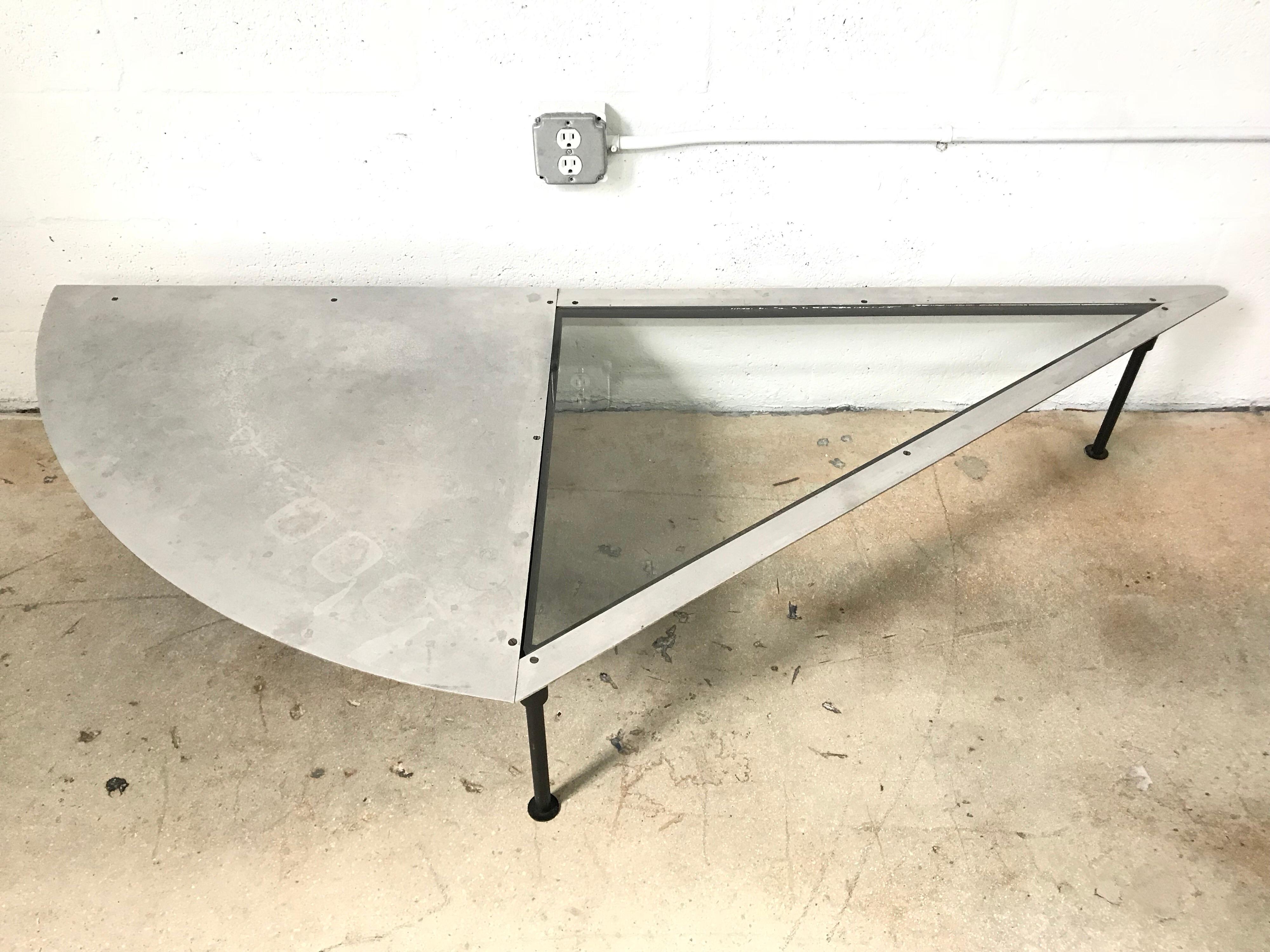 Artist made one of a kind cut steel and glass sculptural coffee or cocktail table. 1990s