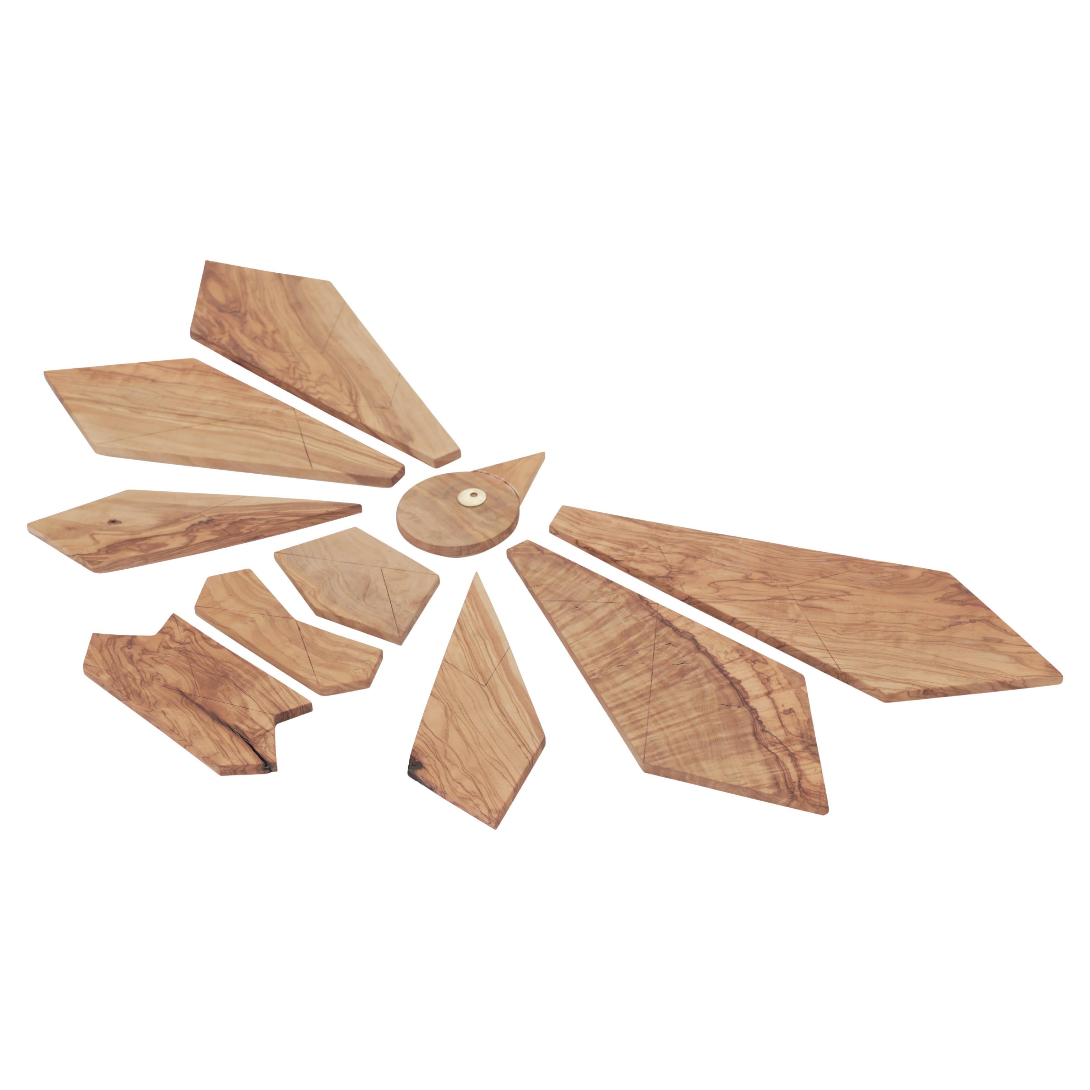 This Stylish Olive Wood Puzzle is a true work of art, crafted from premium olive wood. This unique puzzle is composed of 10 distinct pieces, offering endless creative possibilities. Thanks to its modular design, you can assemble it in eight
