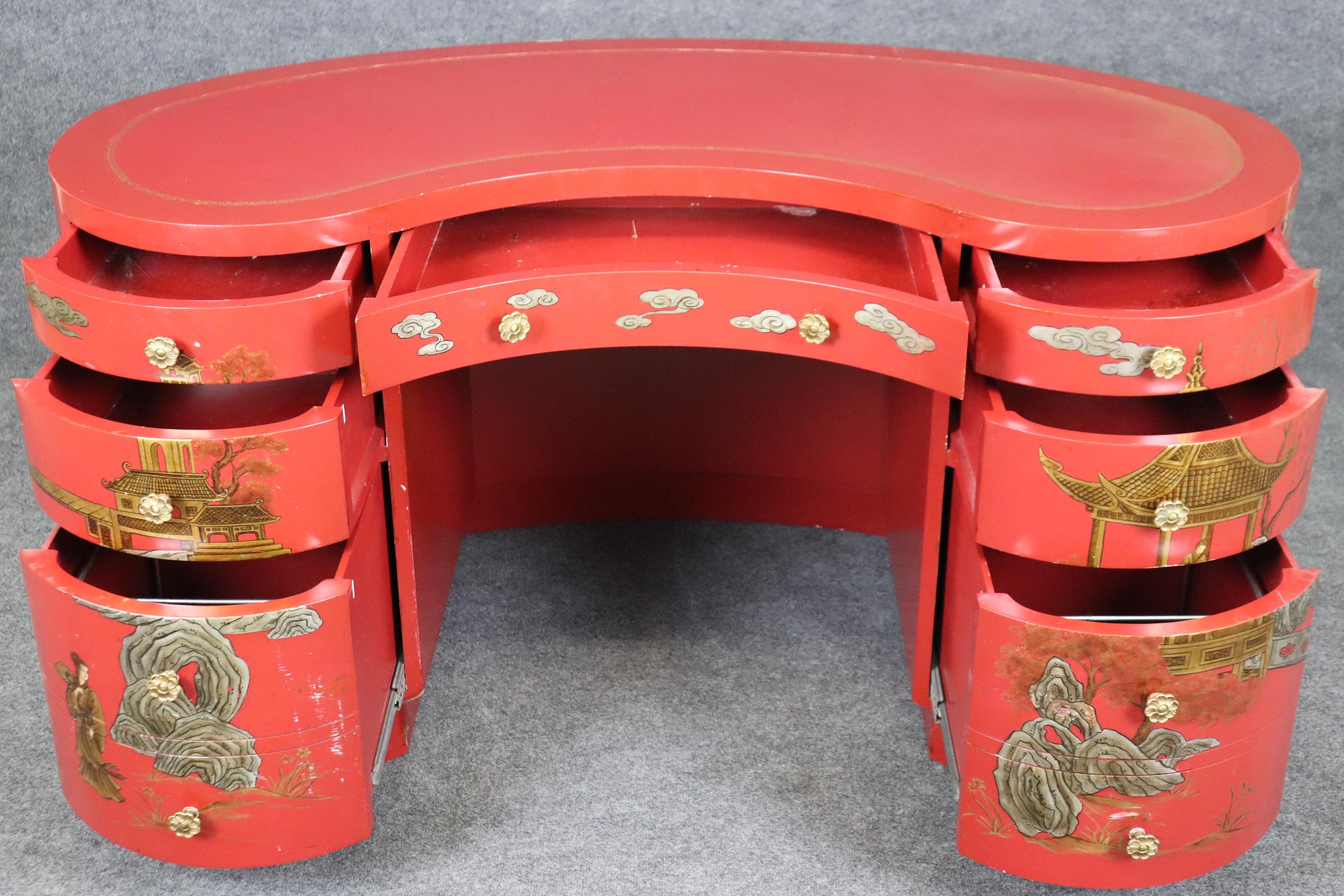 This is a very unique desk. The desk is paint decorated in chinoiserie Chinese painted figures in Chinese pastural settings. The desk Measures 60 wide x 31 deep x 30.5 tall. The desk is in good condition with minor scuffing from vacuum bumpers