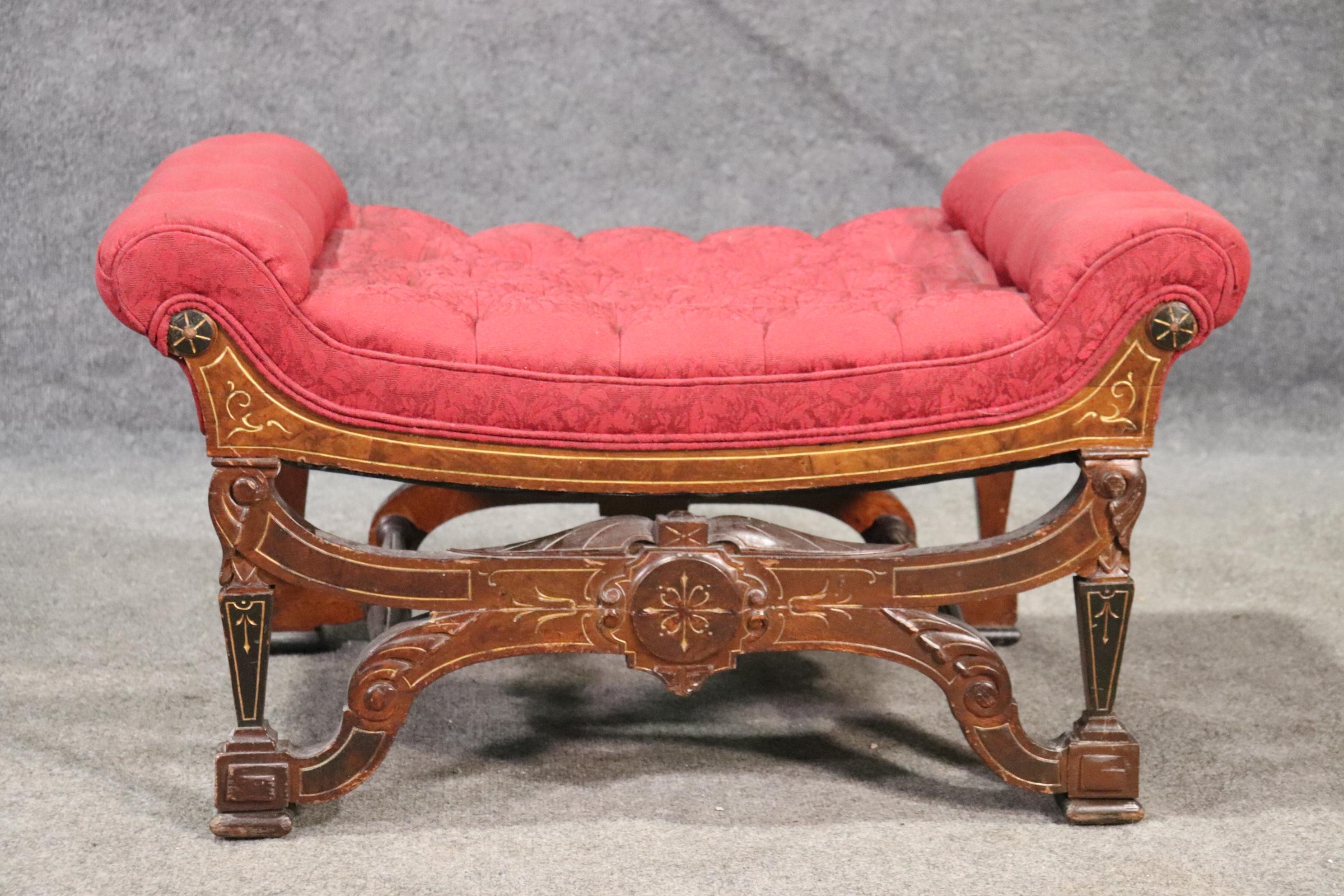 This is a gorgeous bench most likely made by Pottier & Stymus. The bench is in good condition for its age and has beautiful carved details. The bench measures 32 wide x 18 inches tall x 18 inches deep.