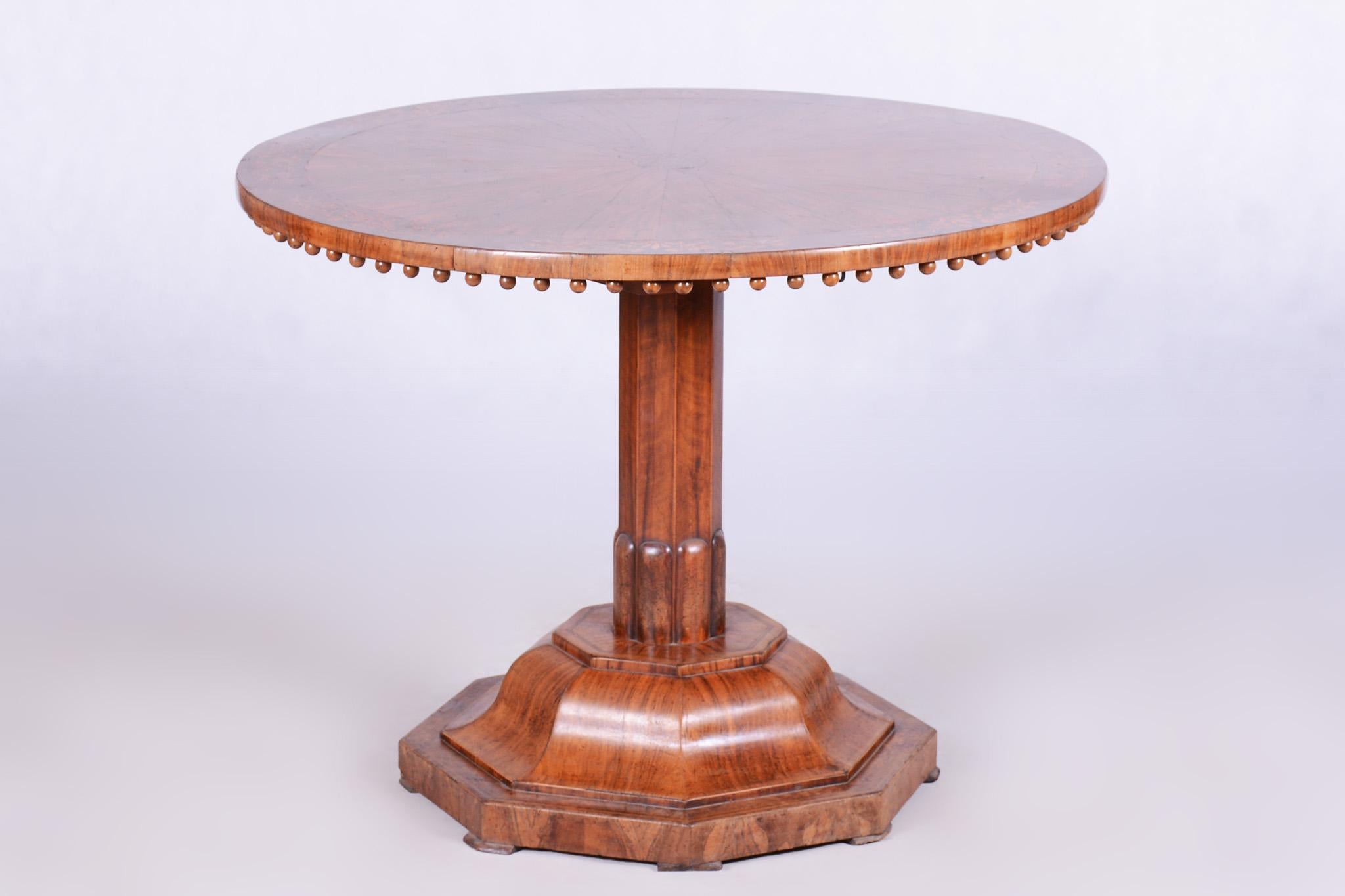 Unique Restored Austrian Biedermeier walnut folding round dining table.

Period: 1820-1829
Architect: Josef Danhauser
Source: Austria

The table has a very practical mechanism for folding the top plate.
Completely restored.
Revived by the