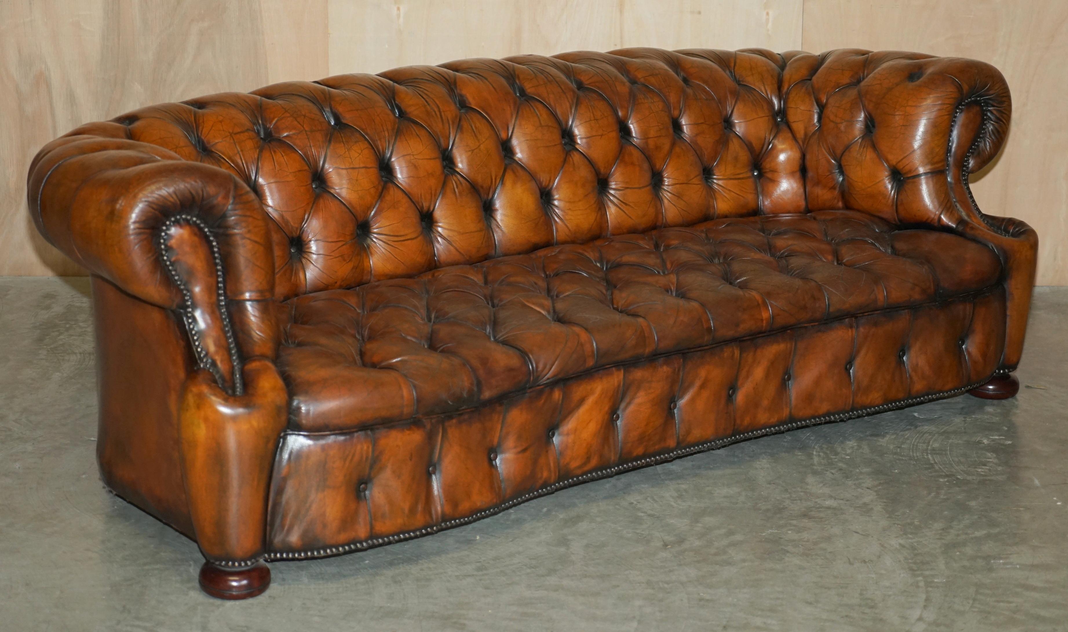 We are delighted to offer for sale this stunning, fully restored Vintage, hand dyed cigar brown leather serpentine fronted Chesterfield club sofa.

This sofa is very unique, it has a wonderful curved front edge which in the world of Chesterfield