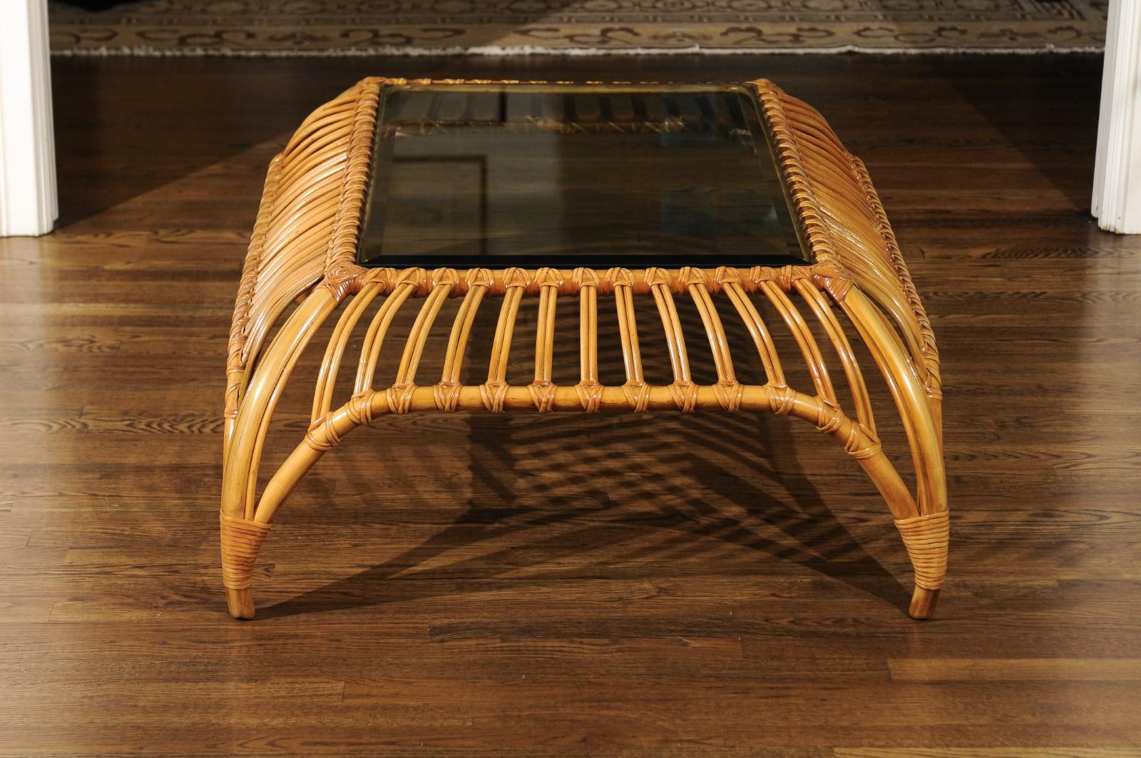 An exquisite and unique coffee table by the esteemed Henry Olko for his Willow and Reed firm, circa 1979. Mr. Olko, himself, has confirmed that this special low production piece is his work. This rare example is from his boutique Tiara series. Stout