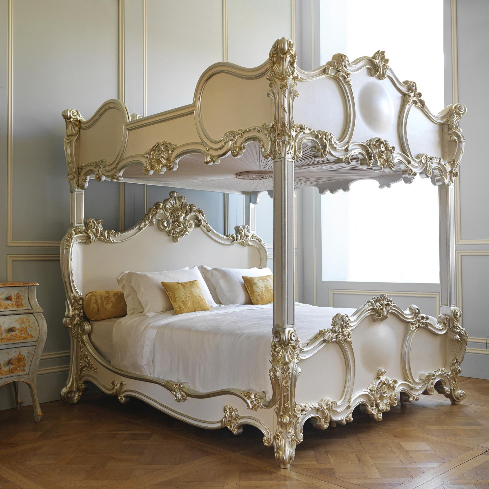 A Unique bed by La Maison London, masters of fine wood carving - A Rococo style Four Poster Bed which has a hidden top bed within its 2 tier design. The top section has been designed to look like a canopy so that the bed visually presents as a Four