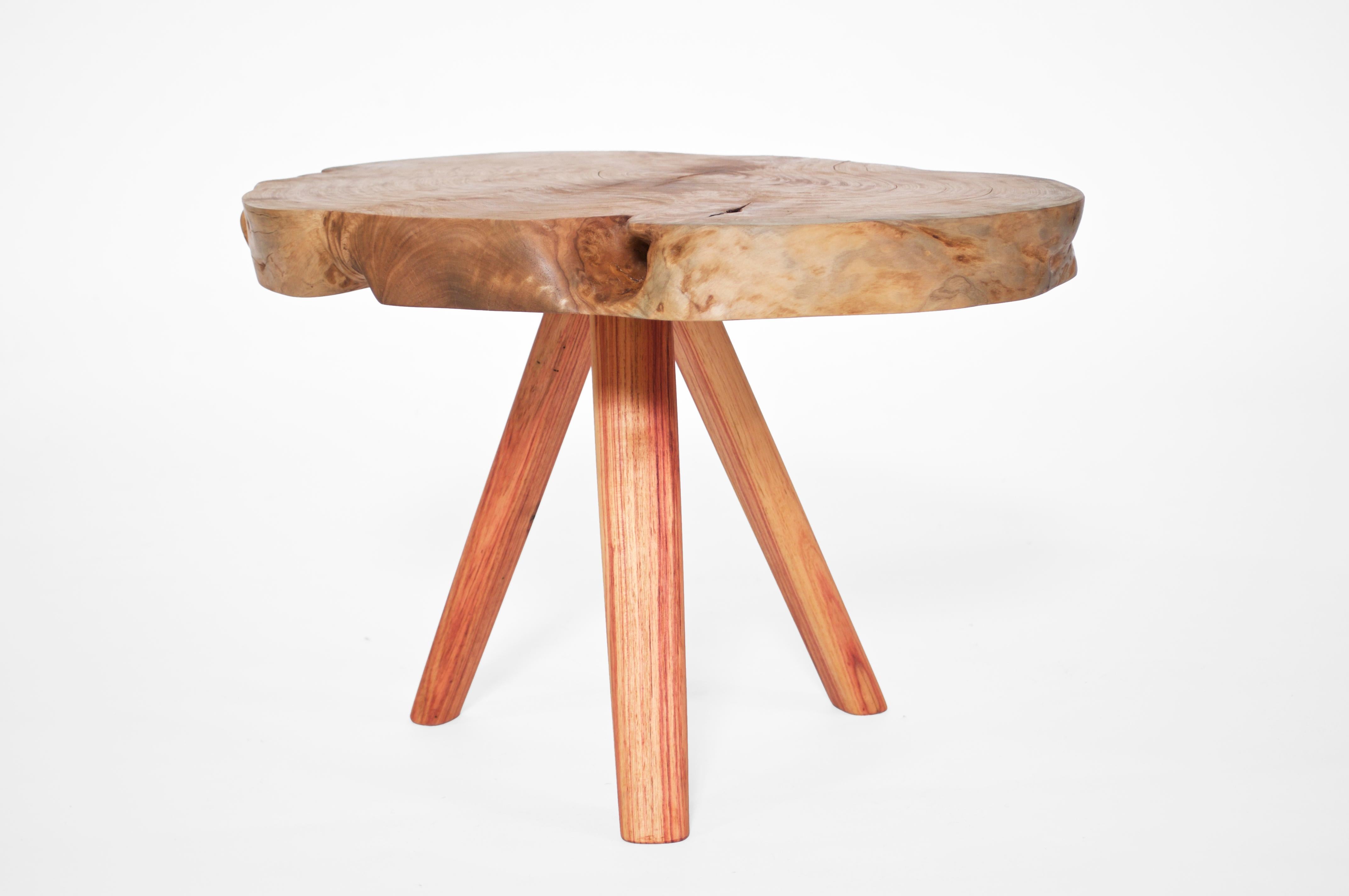 Unique signed table by Jörg Pietschmann
Materials: Lagerstromie, Rosewood, Polished oil finish
Measures: H 33 x W 49 x 38 cm

In Pietschmann’s sculptures, trees that for centuries were part of a landscape and founded in primordial forces tell