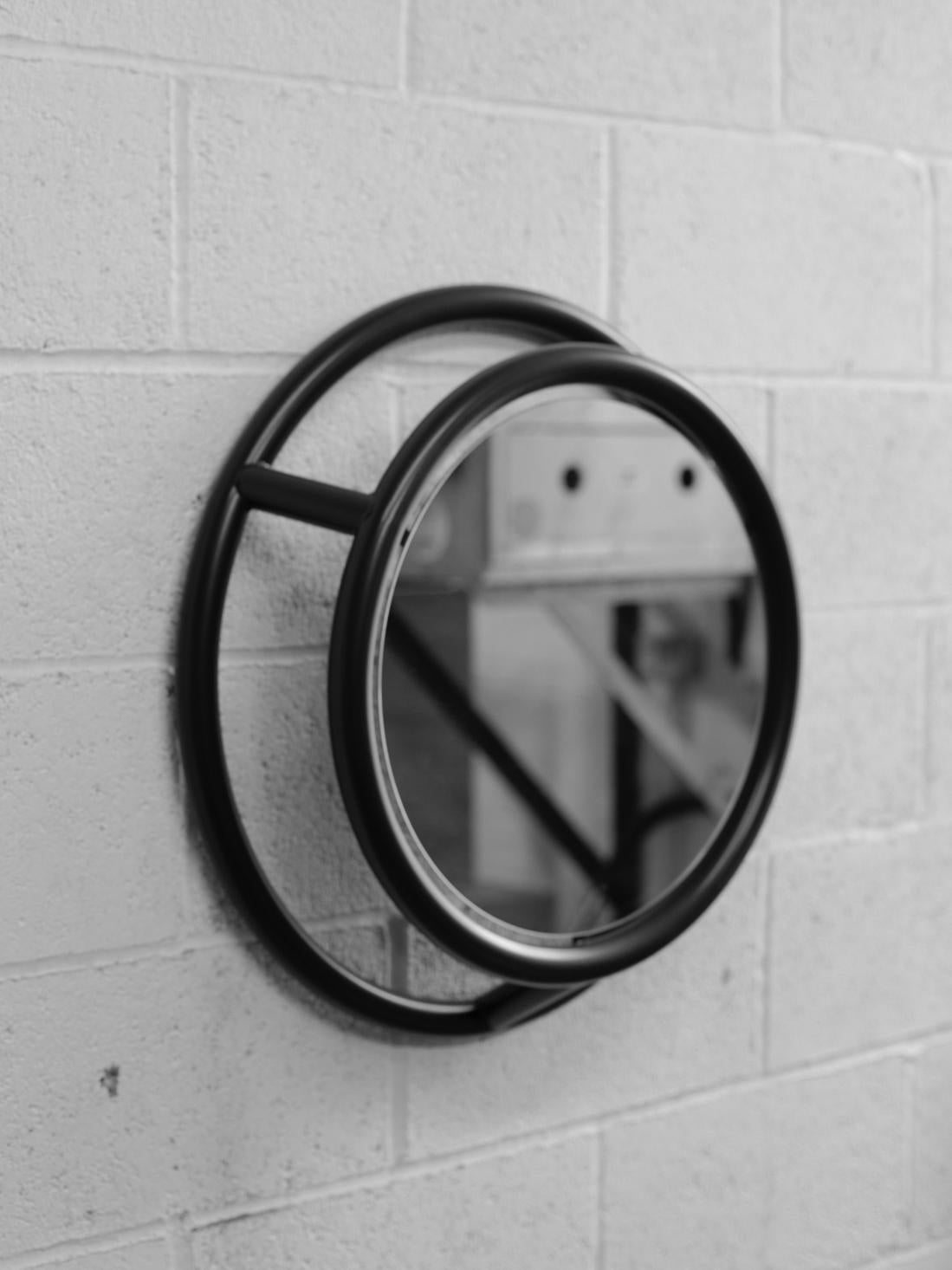 Unique round and round mirror by Kim Thome
Dimensions: D 60 cm
Materials: Steel, float mirror

Kim Thomé is a Norwegian designer based in London.