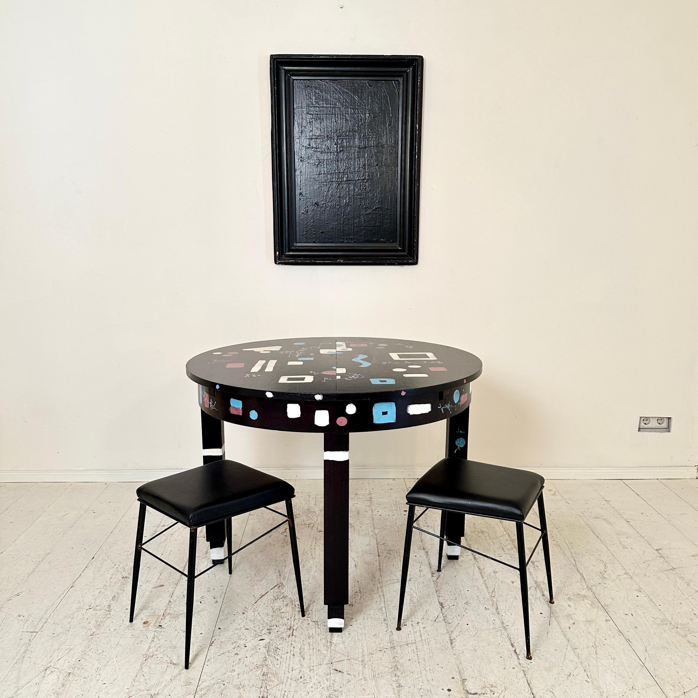 Early 20th Century Unique Round Extendable Bauhaus Table Re-Painted in Black and Multiple Colors For Sale