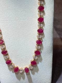 Collana unica in oro 18K con diamanti e rubini per lei