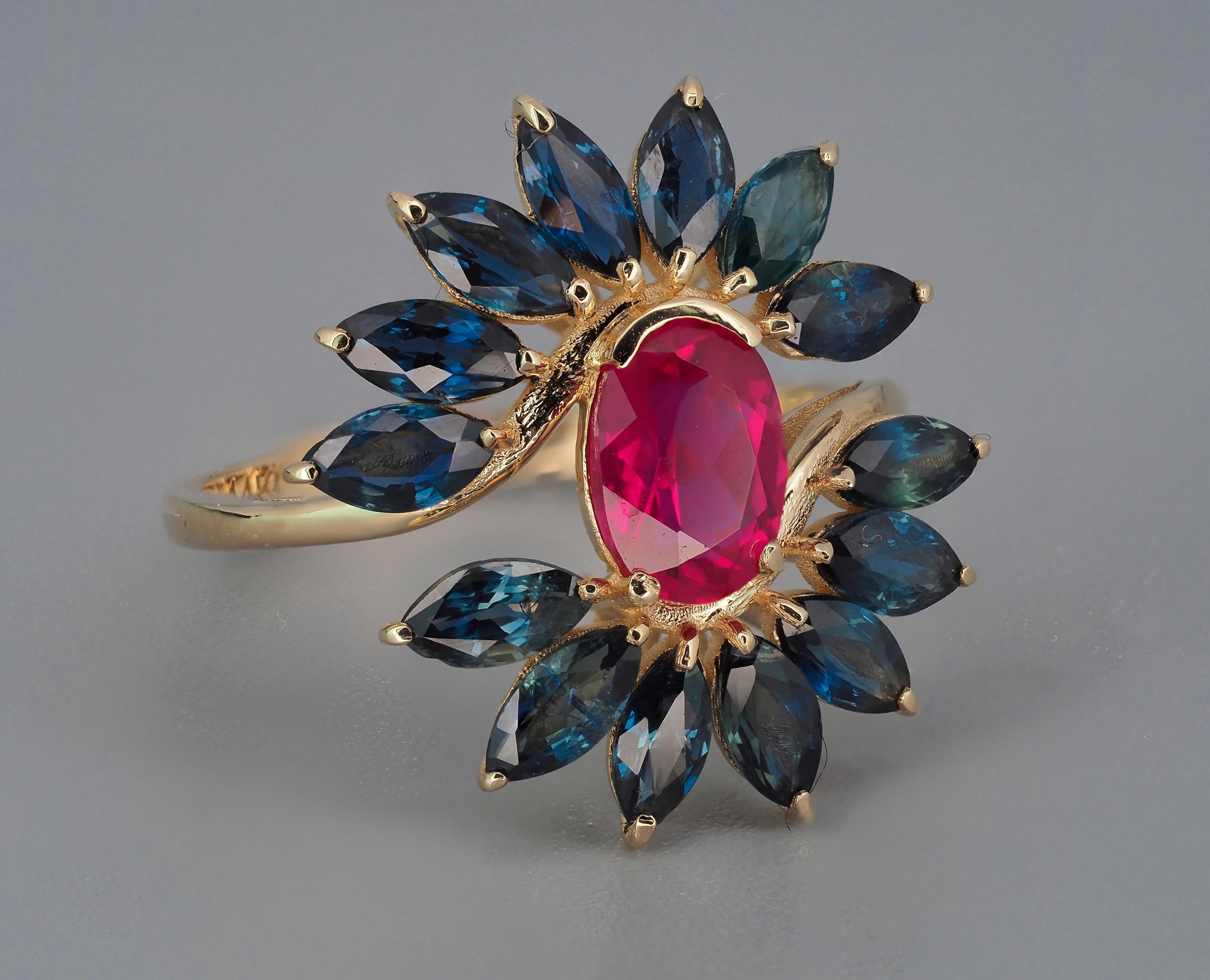 Unique ruby, sapphire 14k gold ring. 
Genuine ruby, sapphire ring. Oval ruby, marquise sapphire ring. Statement ruby ring.

Total weight: 2 g. depends from size.
Material: 14 k gold.

Central stones: Natural Ruby
Cut: Oval
Weight: aprx 1.5 ct.