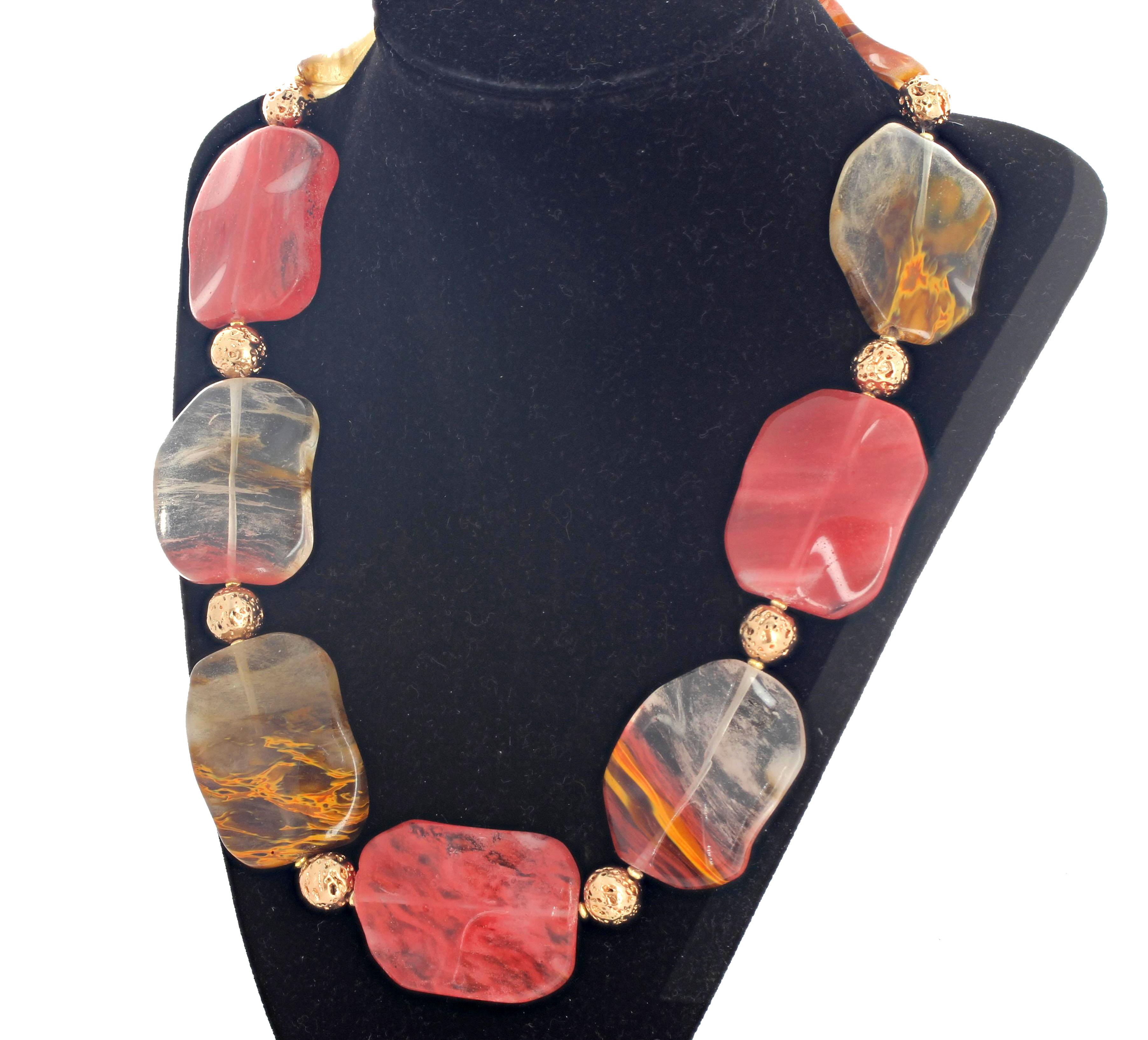 Highly polished glowing translucent wavy natural 40mm x 30mm Rutilated Quartz enhanced with round natural gold plated lava nuggets set in this beautiful 20.5 inch long necklace with gold plated easy to use hook clasp.  This is truly artistically