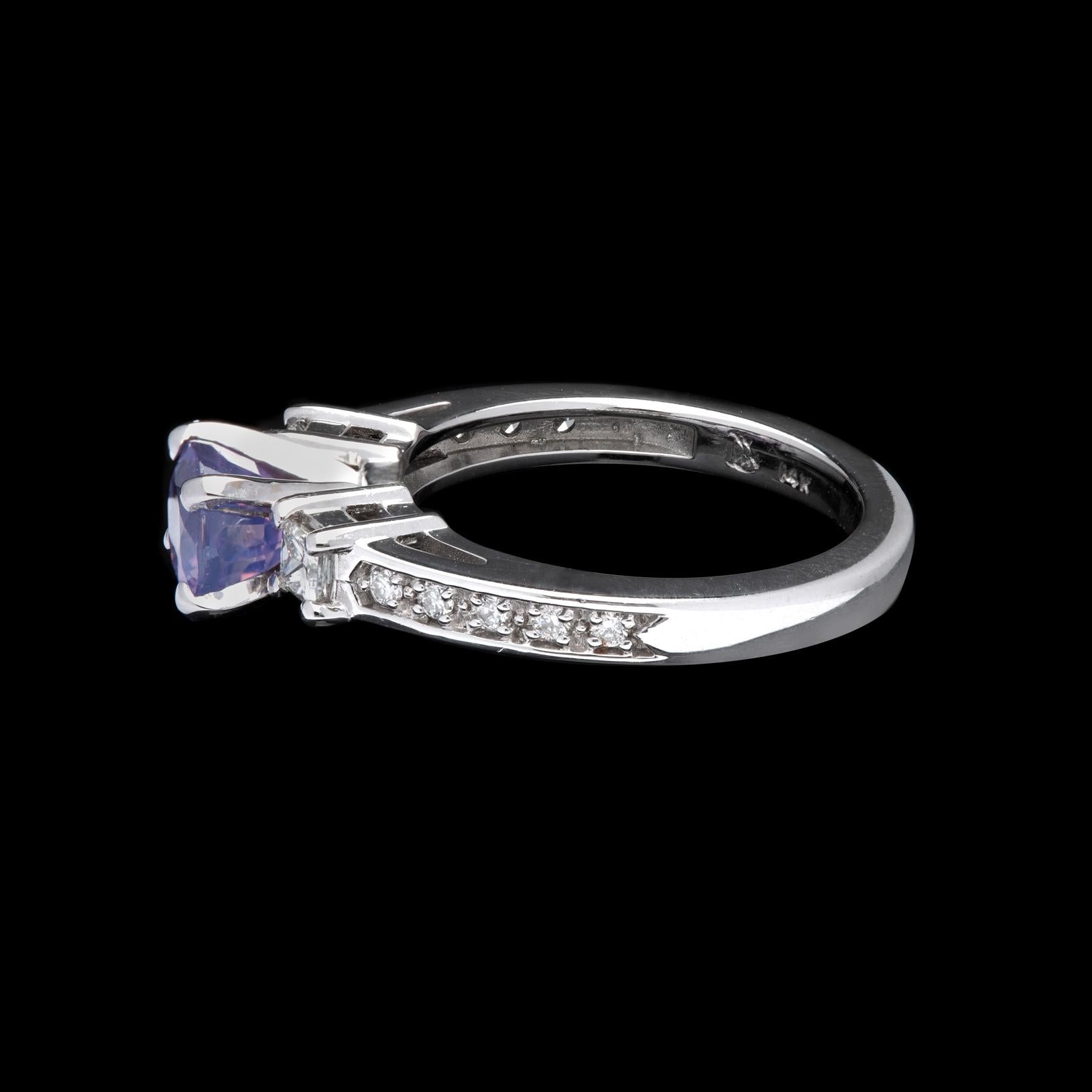Oval Cut Unique Sapphire and White Gold Diamond Ring