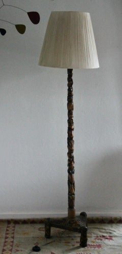 Unique sculpted wood floor lamp