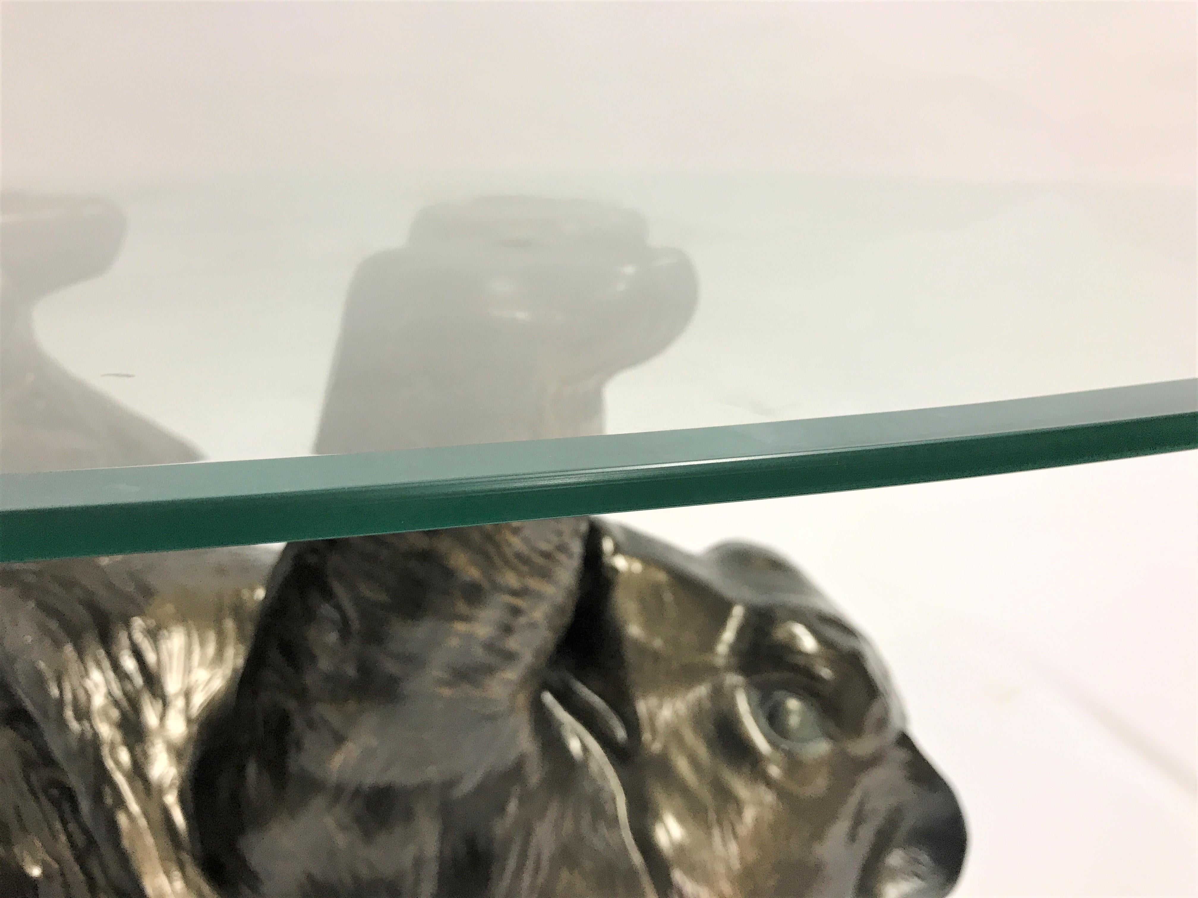 Eye-catching sculptural black bear coffee table.

This unique table looks great and somewhat cute.

It has an oval beveled glass top.

The table is in good condition.

1980s - Belgium

Dimensions:

Height: 38cm/15”
Width: