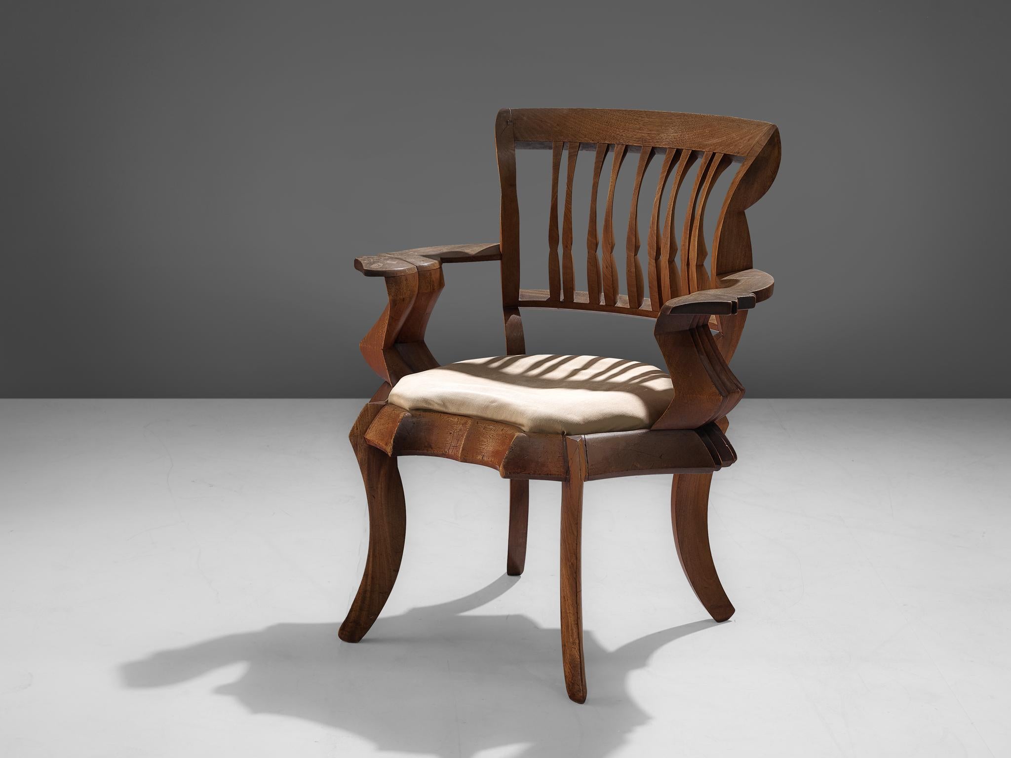 Armchair, solid mahogany, fabric, The Netherlands, 1927

This one-off chair was designed by a student of the Instituut voor Kunstnijverheidsonderwijs in 1927. It was chosen to be featured in a publication called Nederlandse Ambachts- en