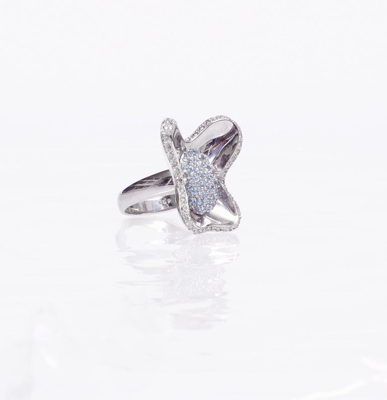 Contemporary Blue Sapphires Diamonds White Gold Ring For Sale