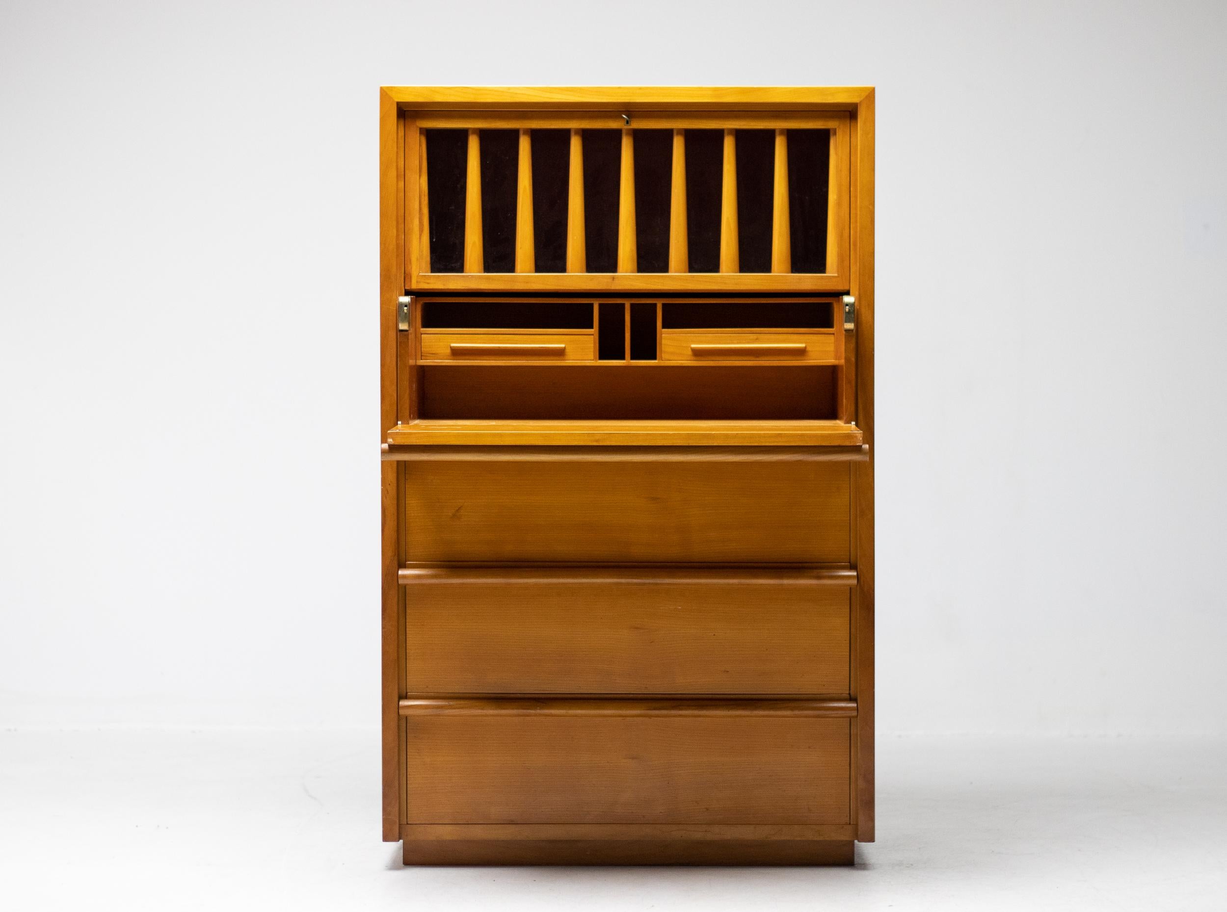 Elegant drop front desk secretary in solid cherry, designed by T.H. Robsjohn-Gibbings for 't Woonhuys.
This design differs in quite a few details from the production version made by Widdicomb.
This is a one-off piece specially made for a Dutch villa