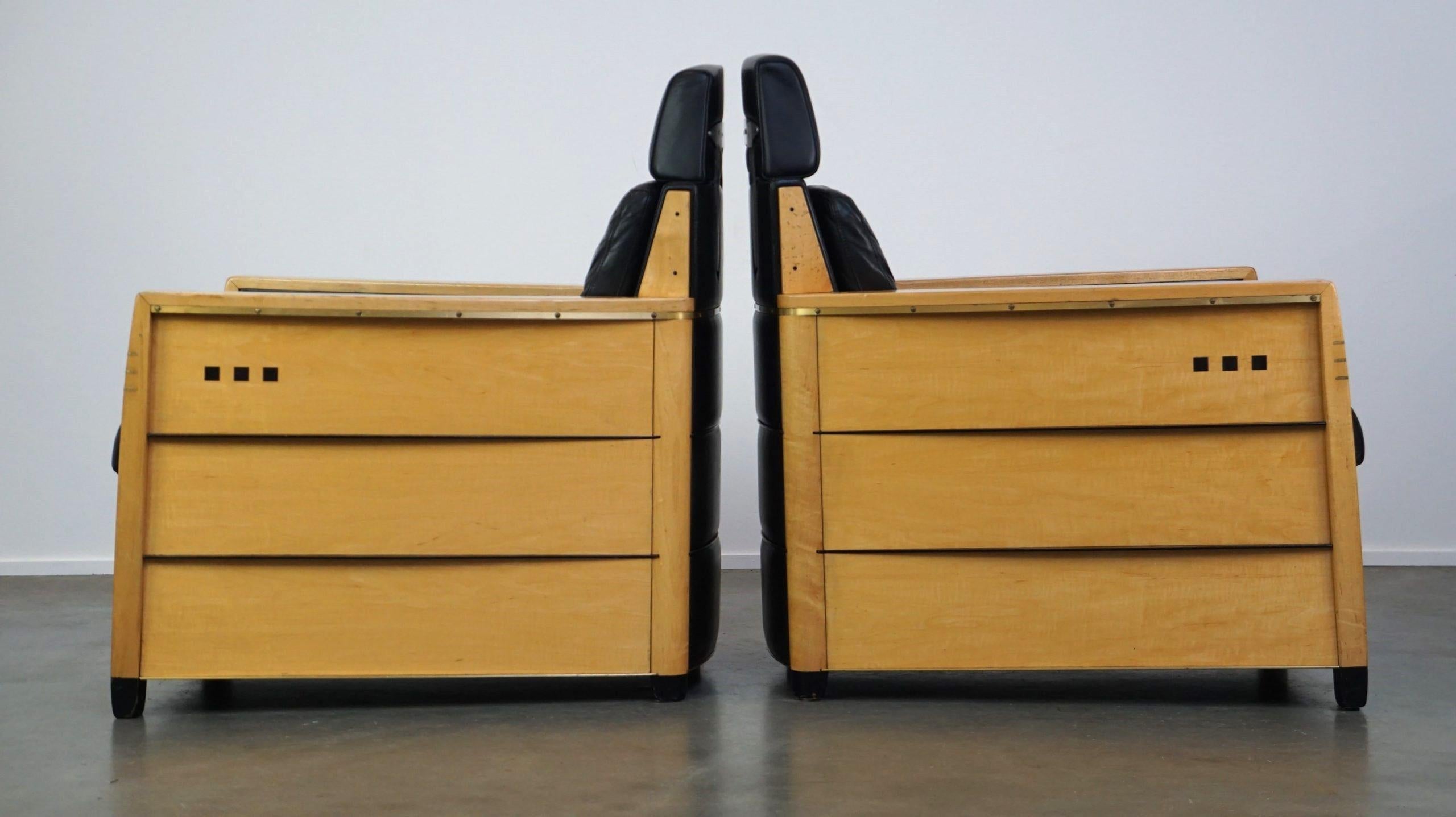 Offered here is this unique set of exceptional black leather Schuitema armchairs with wood, made for the Holland America Line.

This amazing and unique set of armchairs is from the Dutch top brand Schuitema and was designed as a prototype for the
