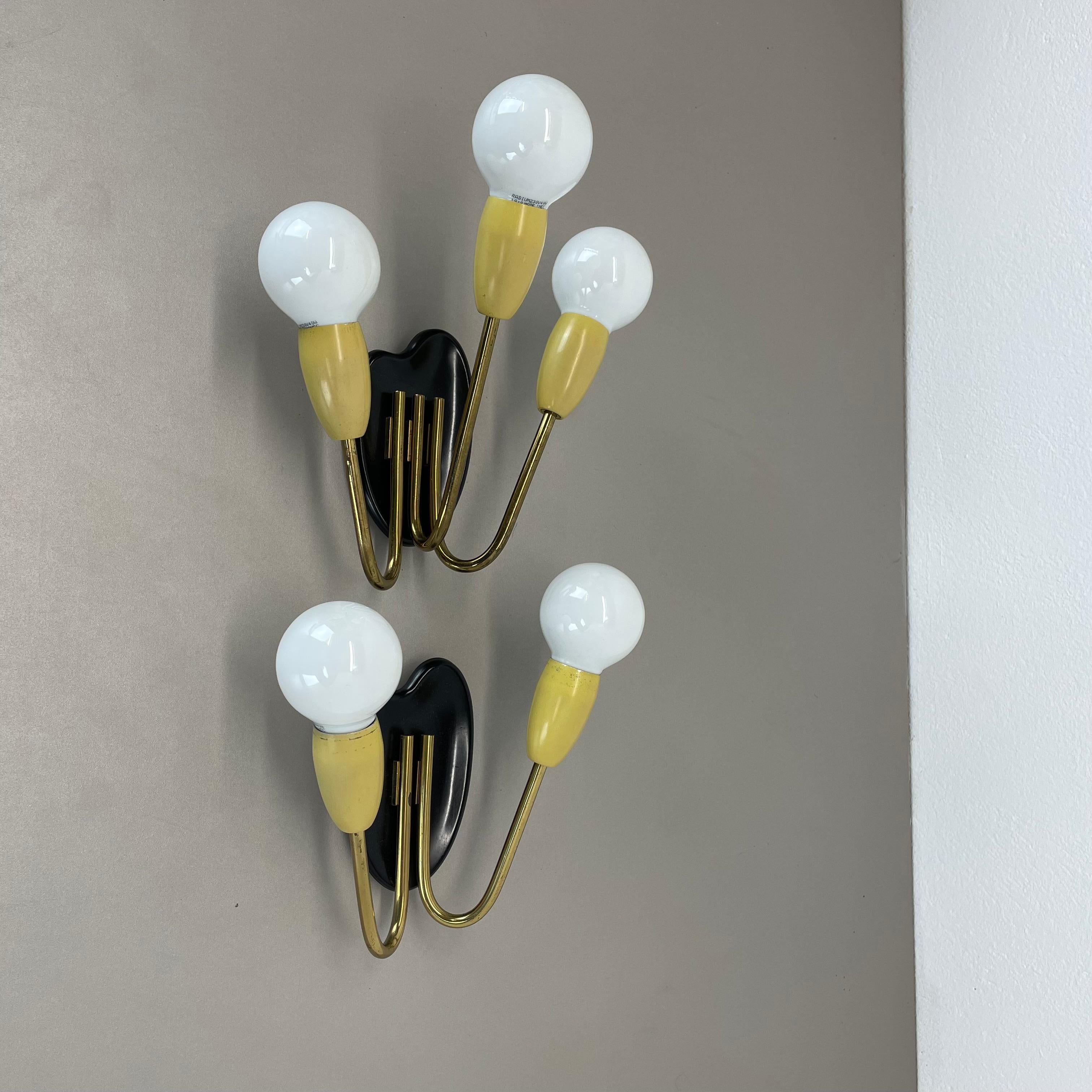 Article:

Wall light, set of 2


Origin:

Italy in the manner of Stilnovo, Gio Ponti



Age:

1950s



This modernist light set was produced in Italy in the 1950s in Italy. It is made of brass (wall fixation) and metal (spot shade element); they