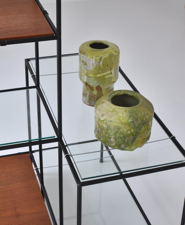 Stunning handmade stoneware vases by Danish artist Ole Bjørn Krüger (1922-2007) in his own workshop in the 1960s. Beautiful organic shape and thick green glazing.

Provenance: Both vases was bought directly from the estate of the artist.