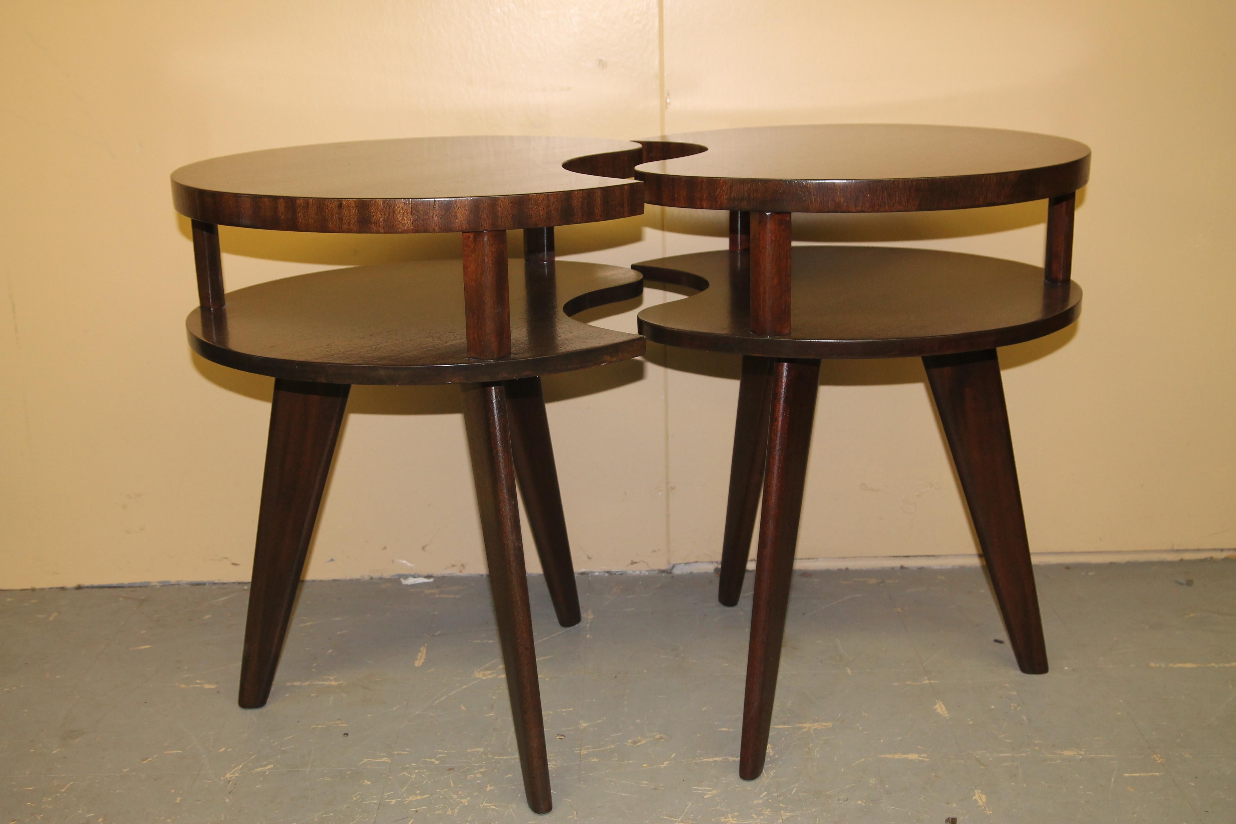 Great pair of side table. Have the feel of the furniture company Modern age but am unable to find an example of them. Most likely a custom pair by a skilled craftsmen. Have a deco look to them but believe they were made in the 1950s or 1960s.