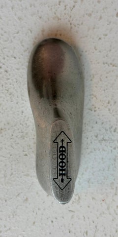 Unique Small Aluminum "Hood" Foot Advertising Paperweight, circa 1960's