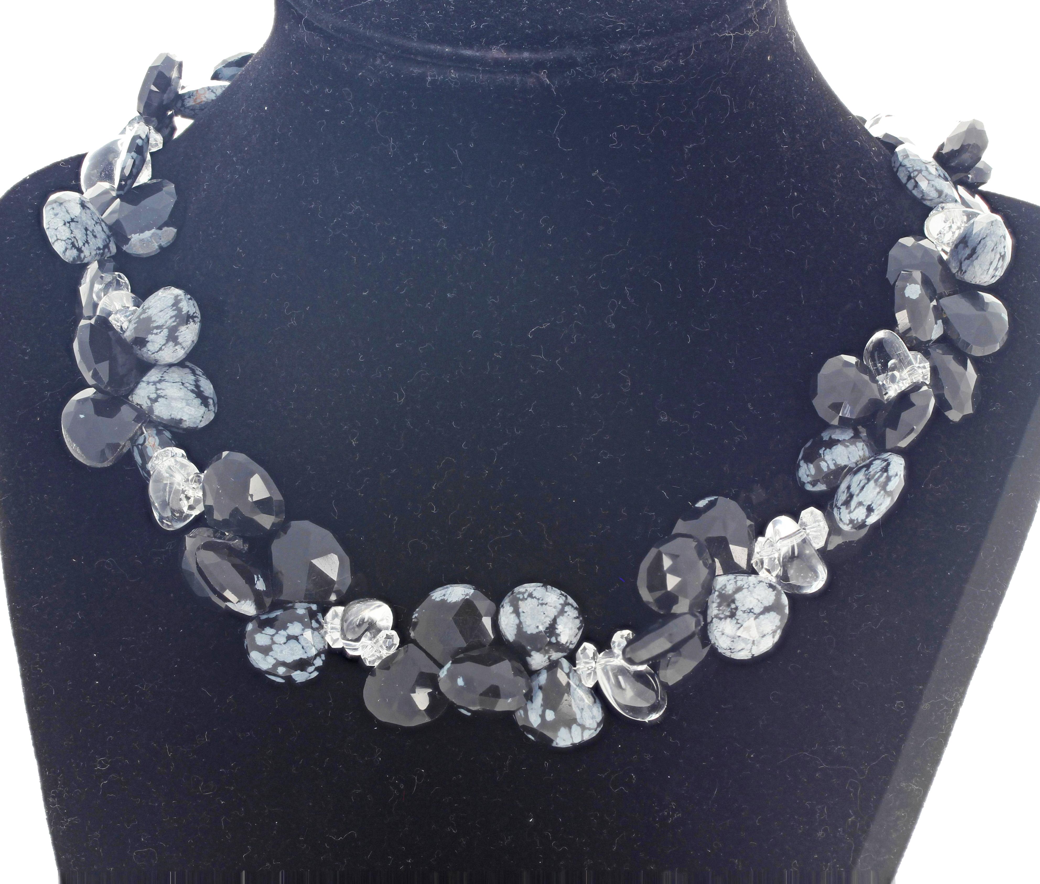 Flippy floppy fascinating beautifully highly polished unusual rare Snowflake Obsidian enhanced with glittering polished chunks of clear silvery sparkling white Quartz set in a 17 inch long necklace with silver plated easy to use clasp.  The