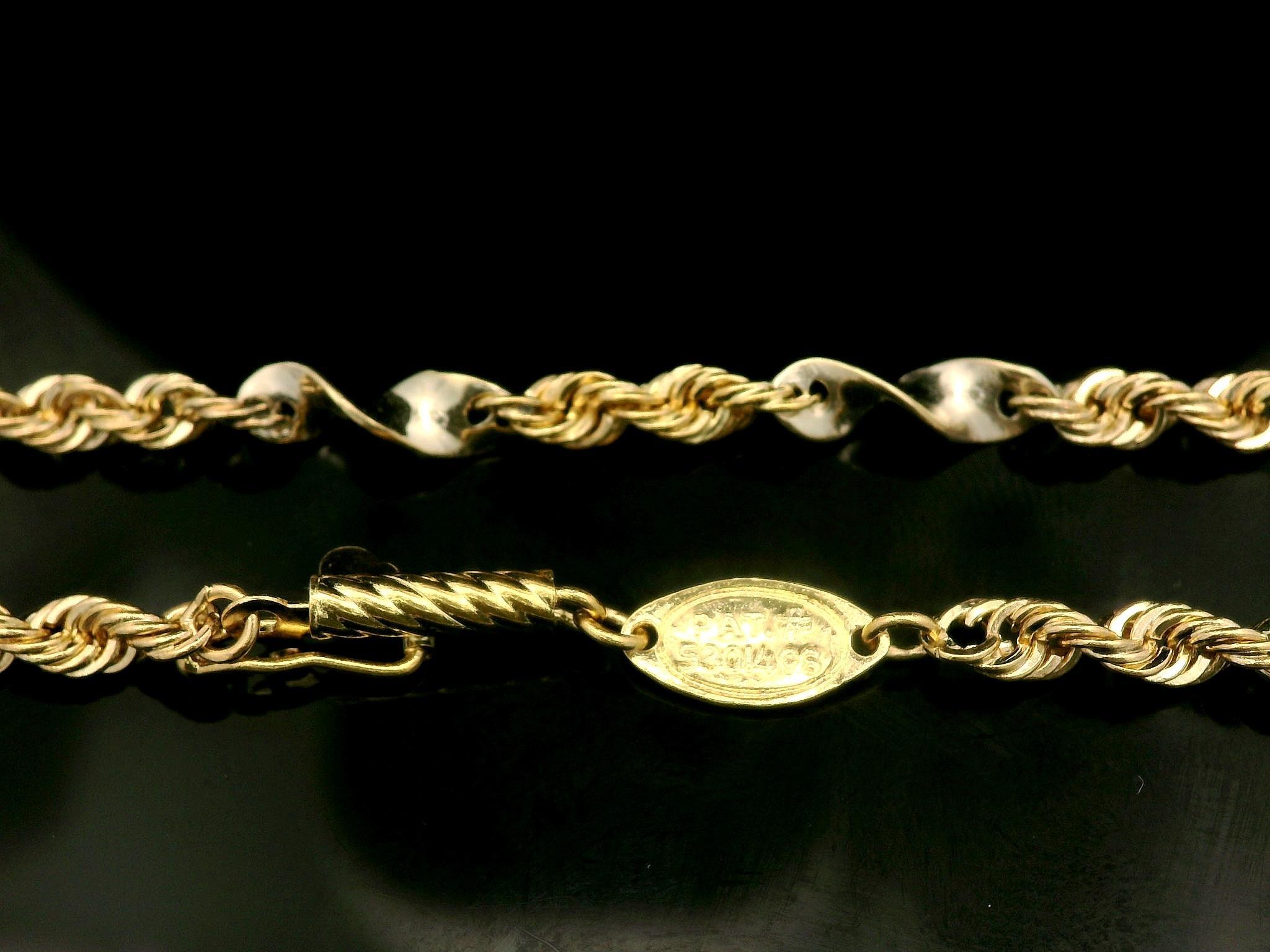 Collier unique en or jaune et blanc 14k avec chaîne à maillons en forme de tourbillon de 16
