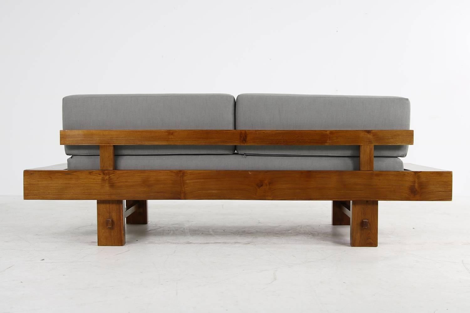 Super rare, solid balinese teak wood daybed, solid and heavy weight wood, teak or sheesham, overall solid wood, new upholstery and covered with new woven cotton fabric in grey, free standing, fantastic wood and patina, a masterpiece and an unique