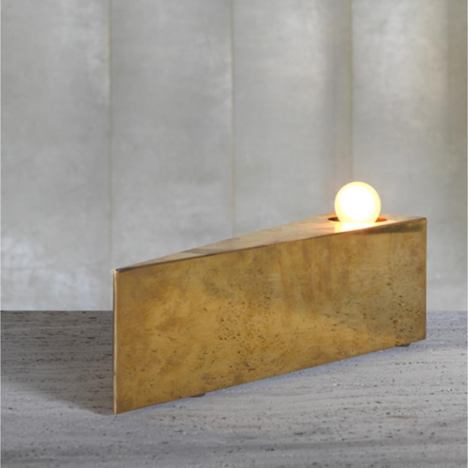 Unique Spy table lamp by Koen Van Guijze
Dimensions: 45 W x 10 D x 12 H cm
Materials: Brass

Edgy, catchy stand alone luminaire. The untreated brass will get patina with age.

After a career of more than 25 years in the lighting business as a