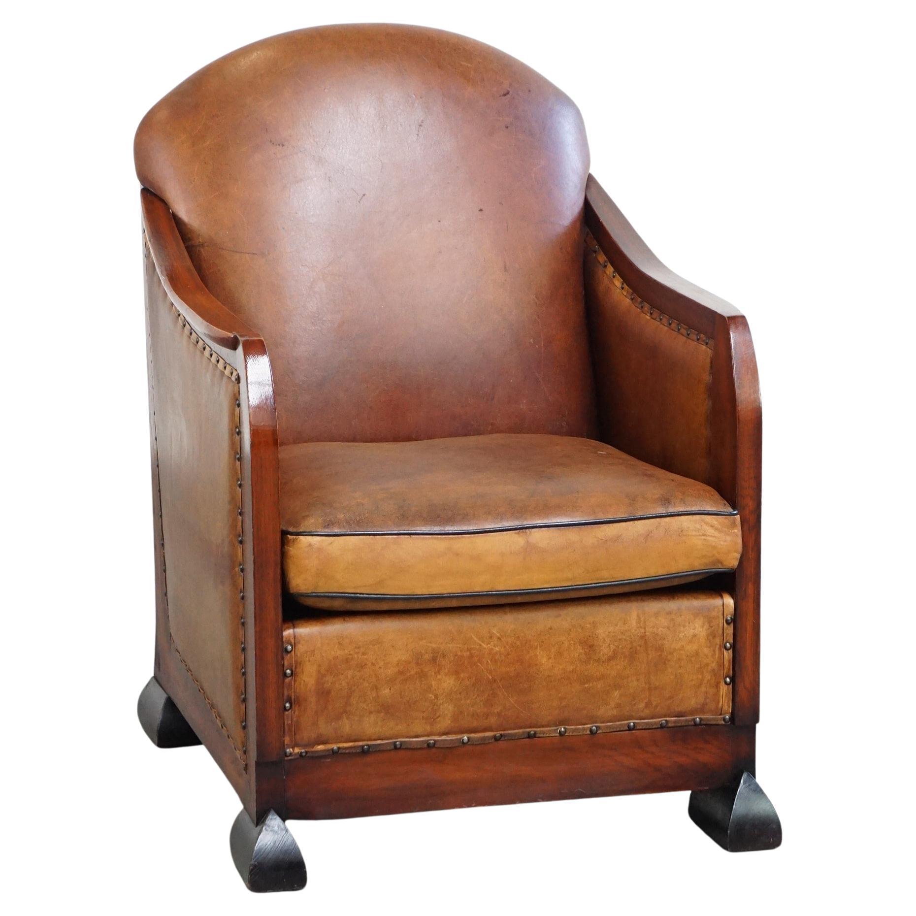Unique, stately, comfortable sheepskin Art Deco design armchair
