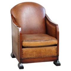 Unique, stately, comfortable sheepskin Art Deco design armchair