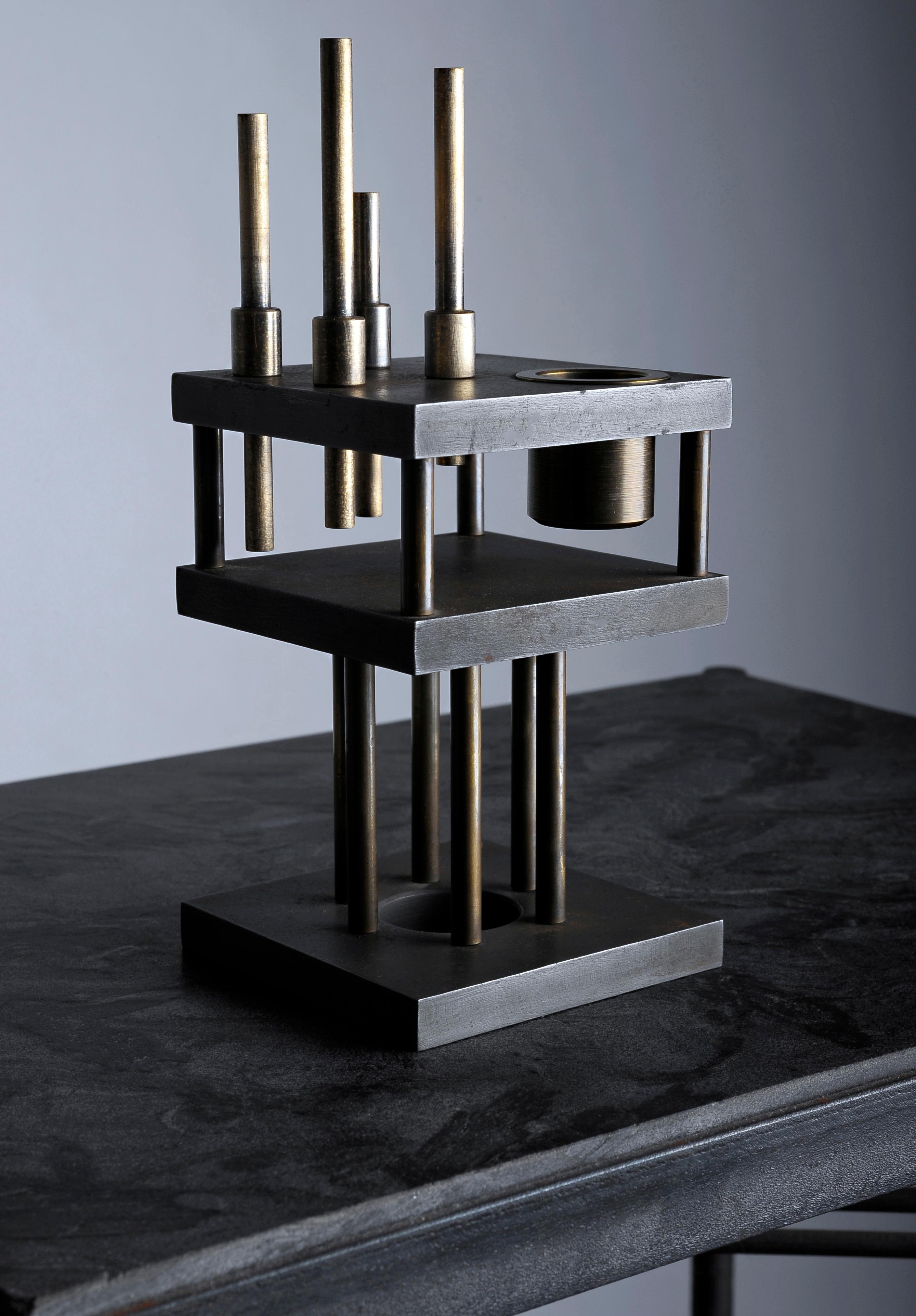 Unique Steel and Brass Candleholder “Brut”, Signed by Lukasz Friedrich.
Steel candleholder “Brut”.
Measures: 8 x 8 H 20 cm.
Finish: Patinated steel with brass details.
Limited Edition of 100.
Signed.