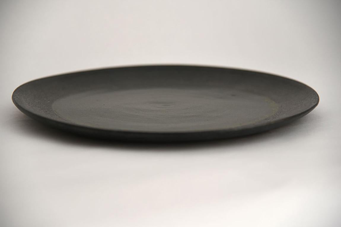 Stoneware plate - high-end ceramics. For serving or decoration.

Unique piece.

Material: Sandstone
Color: blue  / black