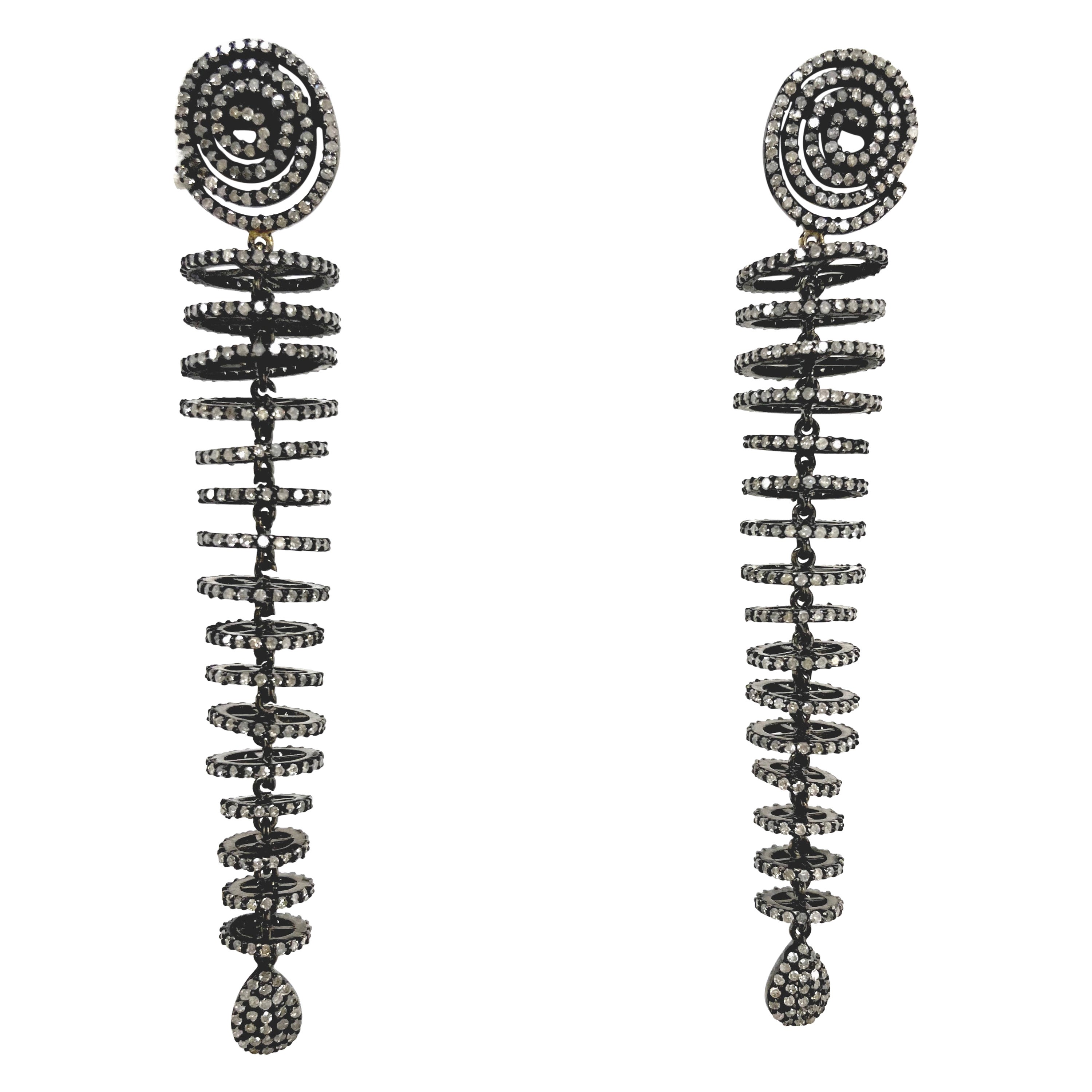 Boucles d'oreilles Paradizia de style unique en rondelles de diamants paves gradues