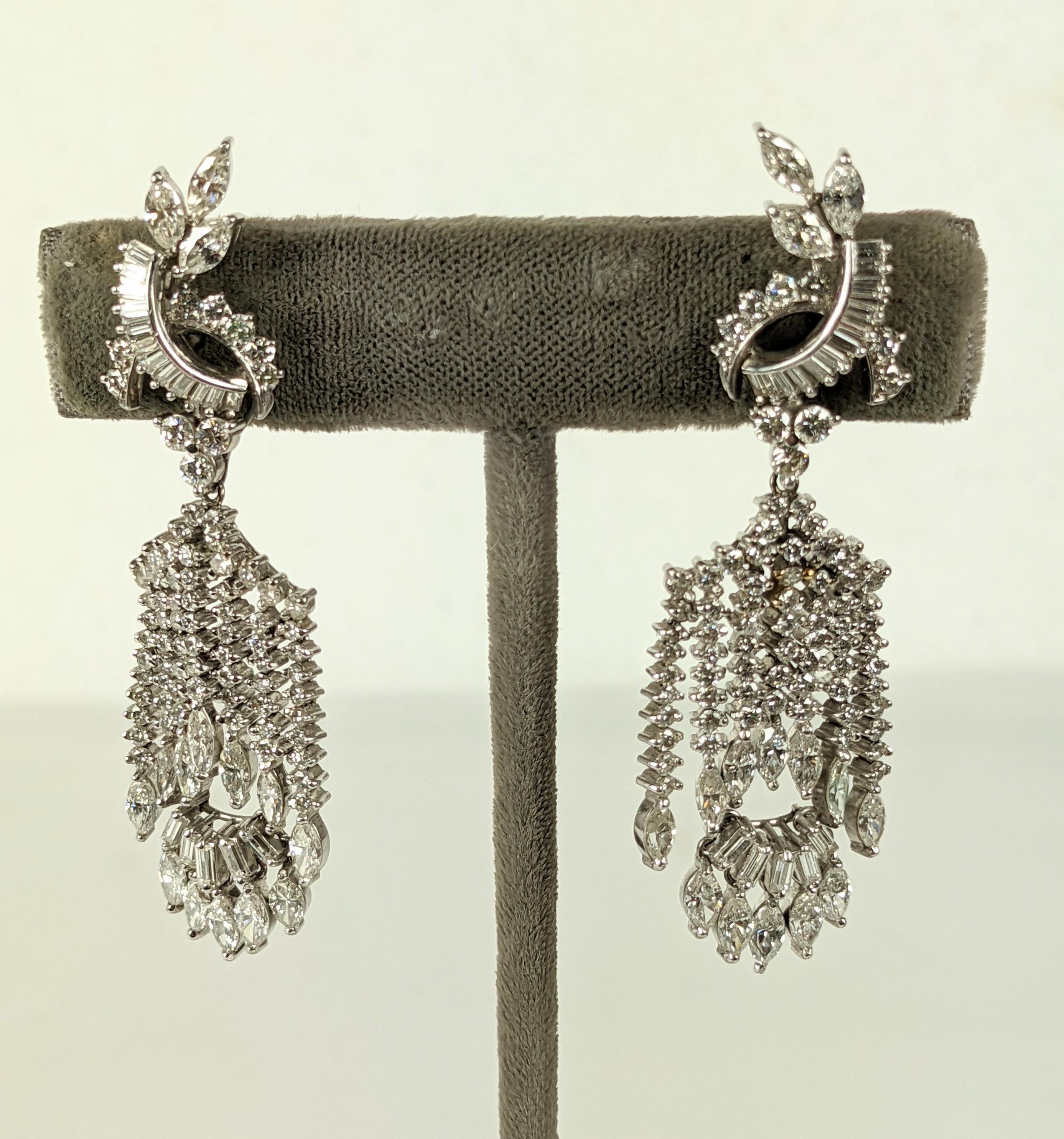Charming and amazing Surrealist Dali Style Diamond Articulated Dangling Man Earrings in 14k white gold. Lines of prong set round diamonds end in marquise shaped stones which represent hands and the 