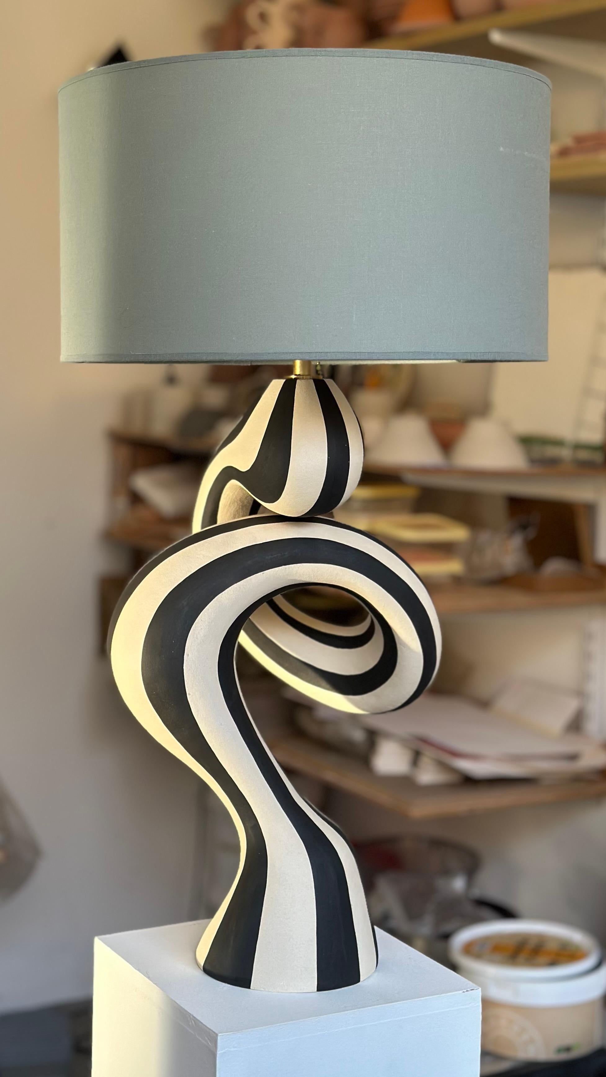 Handcrafted table lamp by Norwegian artist Johanne Birkeland. This particular piece is very unique in its shape, as it requires considerable technical knowledge and patience to build such a form by hand. 

Birkeland works under the artist name