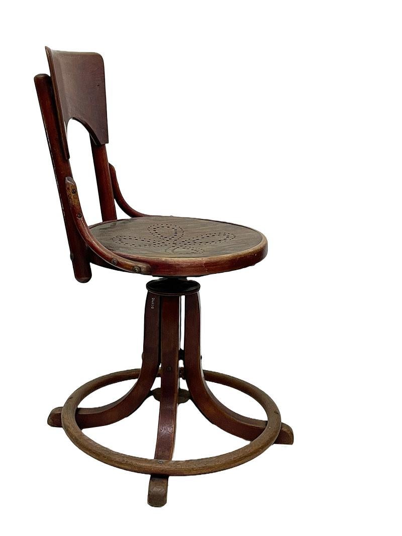 One of our unique Thonet desk chair, Museum piece

It's from a collection of a Museum, The Haque, Netherlands
The chair is adjustable from 85 cm to 95 cm ( not complete turned up)
The seat is height 48cm to 58 cm (not complete turned up) 
The