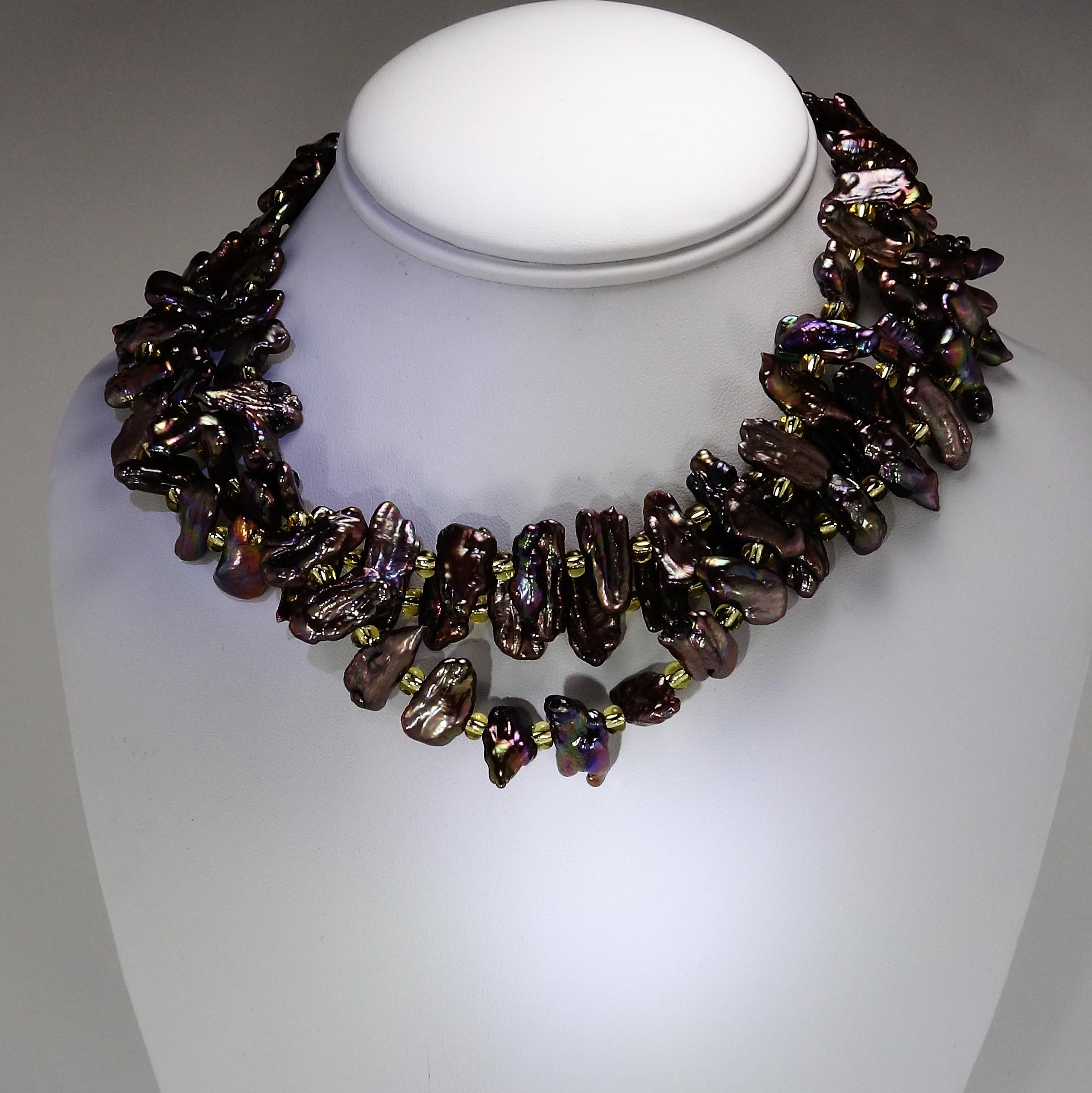 'Put on your Pearls Girls' Lulu Guinness

One of a kind necklace of Mauve Iridescent long pearls (17 x 8 MM) accented with gold Czech beads and gold tone toggle clasp. This is a fantastic choker necklace at 17 inches in length, you can wear it with