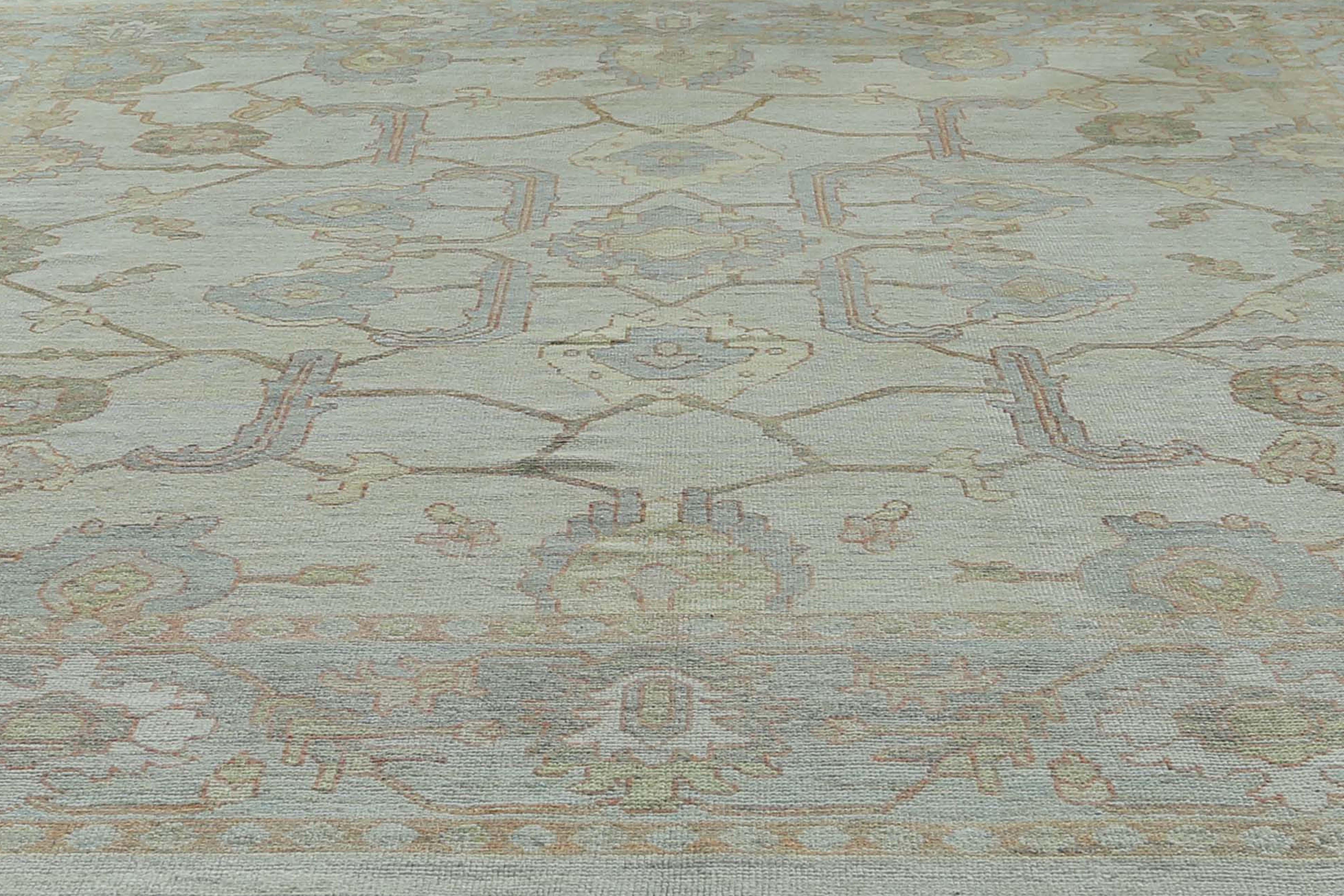 Presentamos nuestra asombrosa alfombra Oushak de 6'7'' x 9'6'', con una cautivadora combinación de colores naranja, azul y verde. Tejida a mano con lana de primera calidad, esta alfombra ofrece una experiencia de felpa bajo los pies al tiempo que