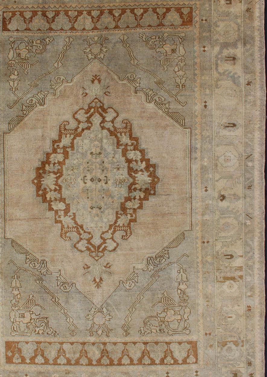 Hand-Knotted Unique Turkish Oushak Rug with Muted Colors in Taupe, Gray, Ice Blue and L.Green For Sale