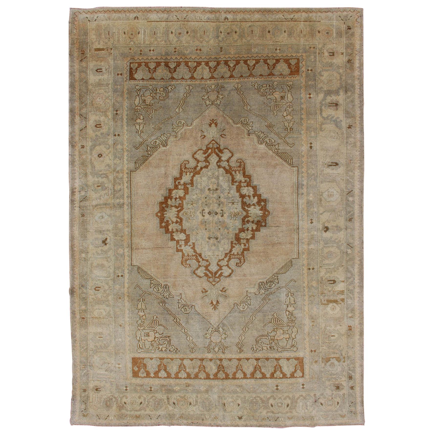 Unique Turkish Oushak Rug with Muted Colors in Taupe, Gray, Ice Blue and L.Green