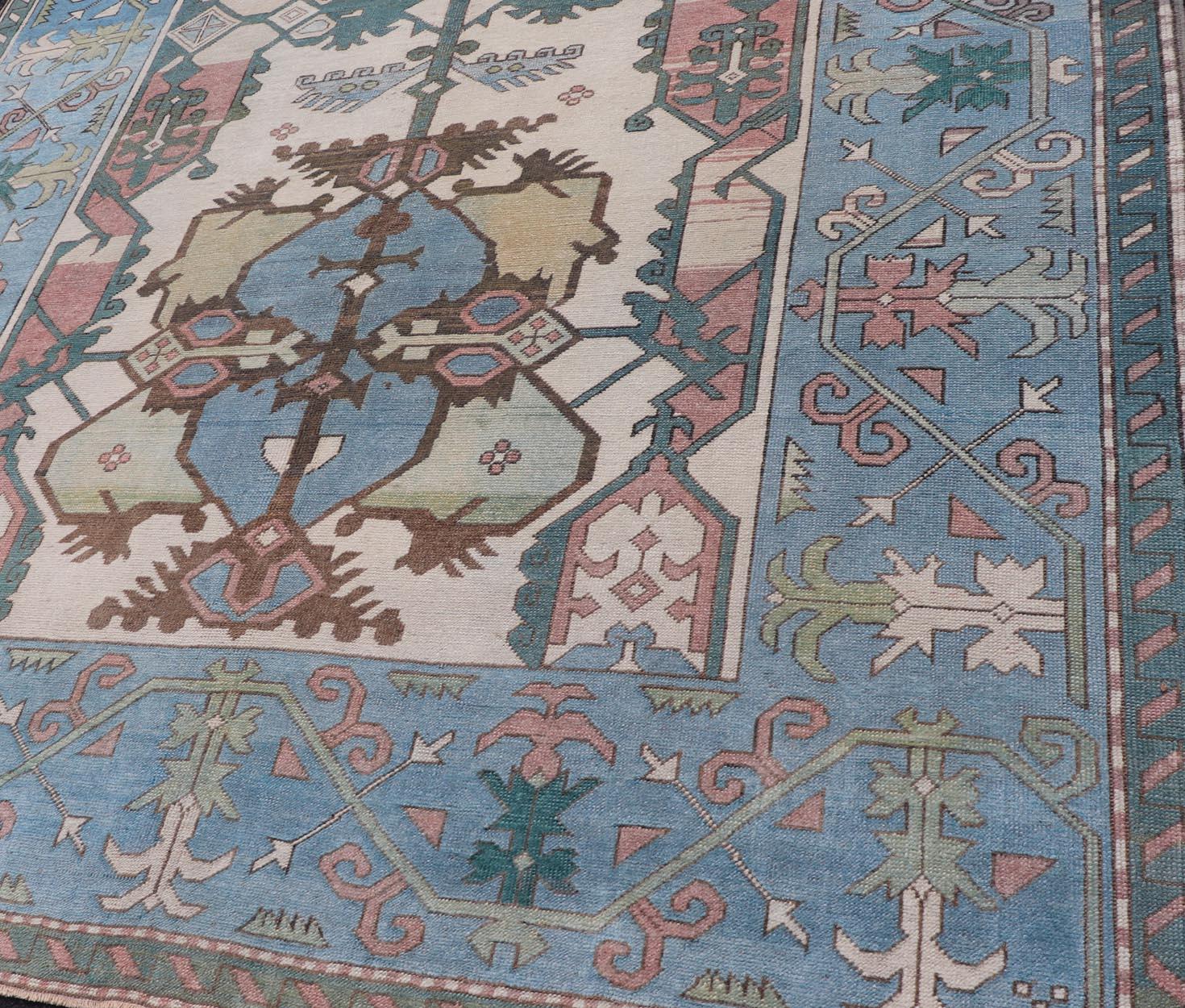 Unique Turkish Rug with Bold Florals in Lt, blue, Lt, Green, Teal & Pink  In Excellent Condition For Sale In Atlanta, GA