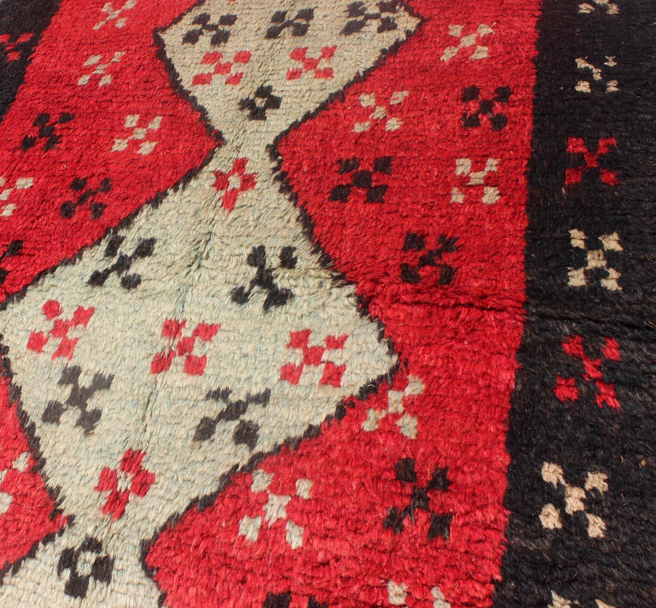 Unique Turkish Tulu Rug with Cream Medallions Red Background Chocolate Border In Good Condition For Sale In Atlanta, GA