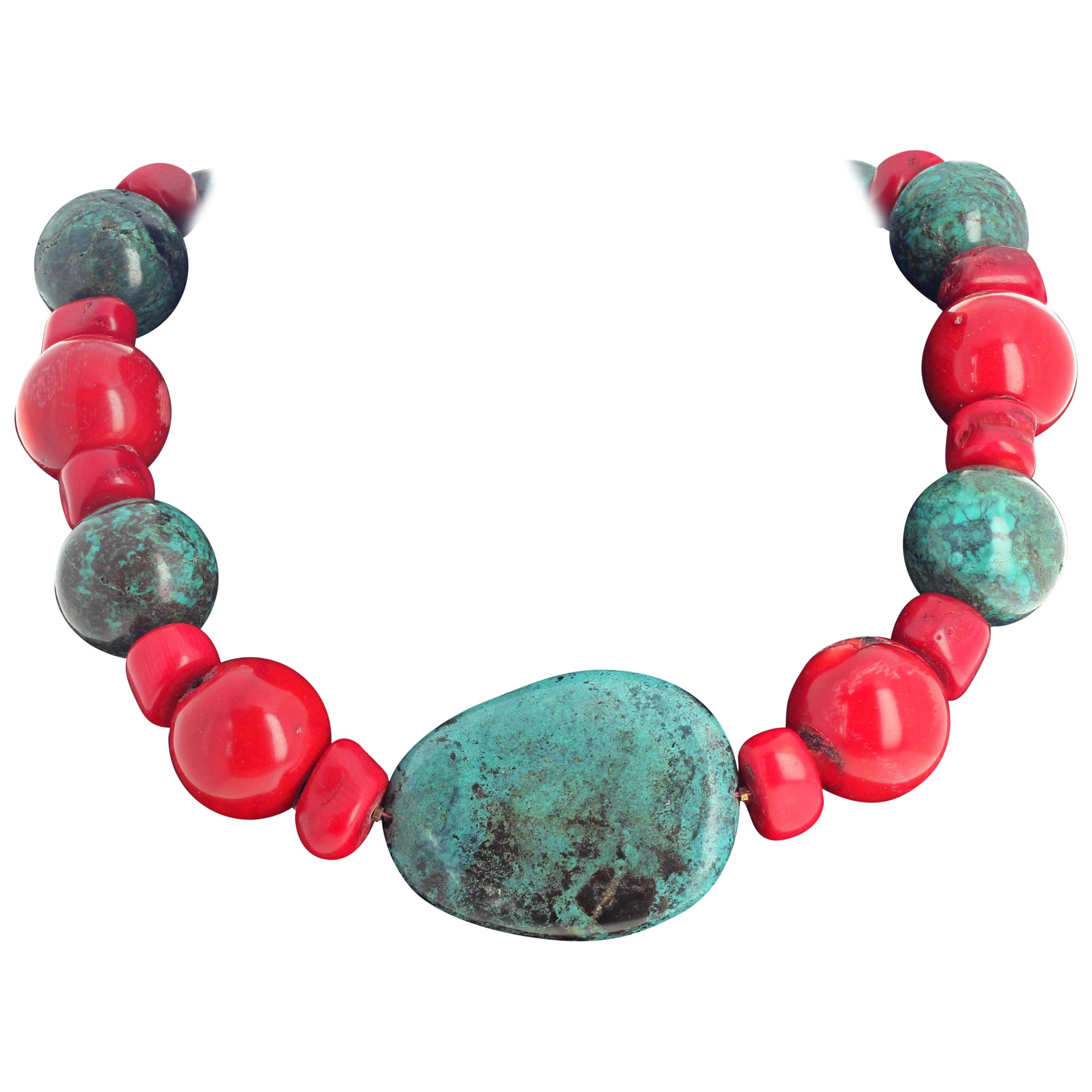 This natural highly polished Chinese Turquoise is enhanced with polished round and polished chunks of natural red Bamboo Coral in this beautiful 18 inch long necklace with gold plated clasp. 
