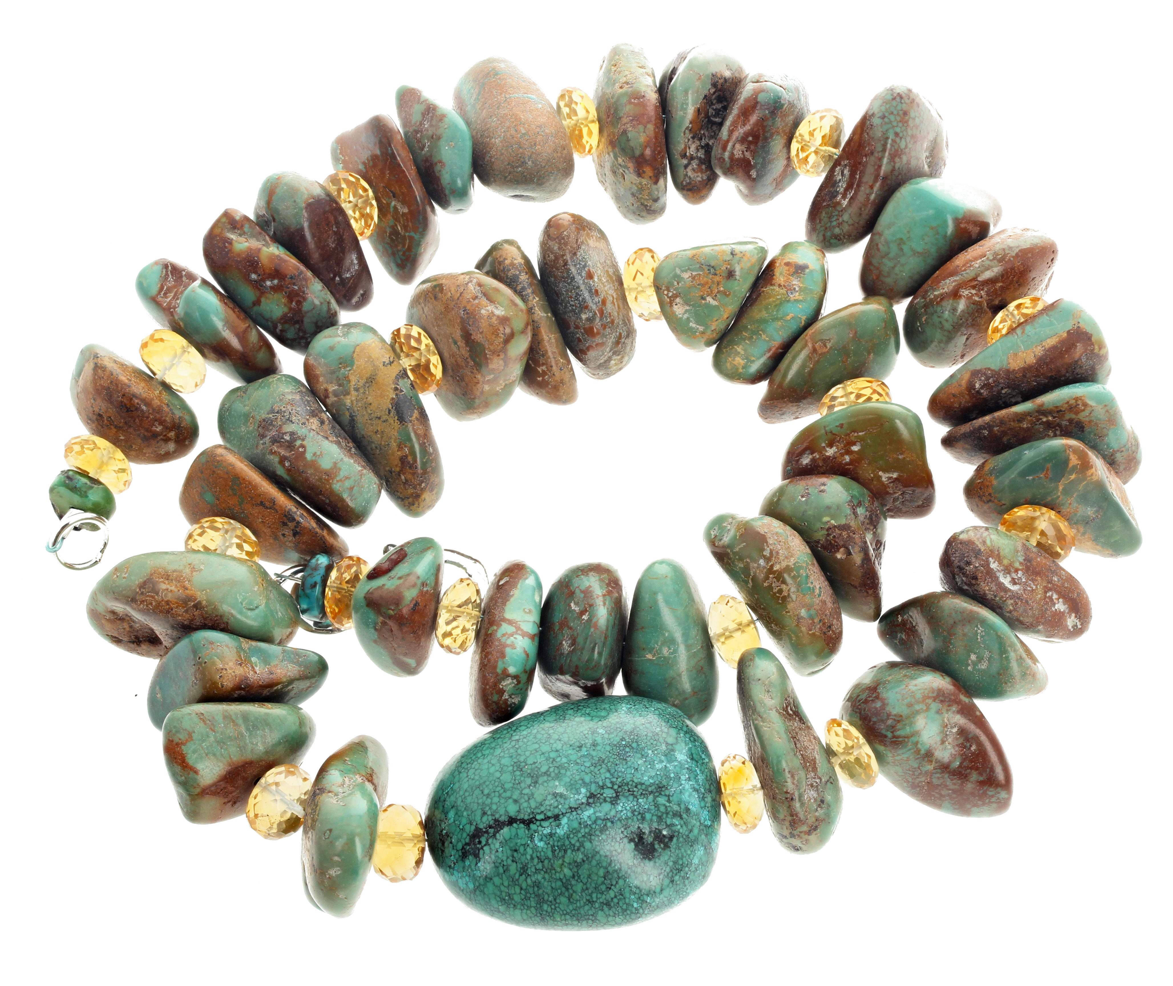 Amazing polished chunks of Turquoise from all over the world, enhanced with sparkling gem cut Citrine rondels, form this 21.5 inch long handmade necklace. with a hook clasp. The center Turquoise is 34 mm x 17 mm.  