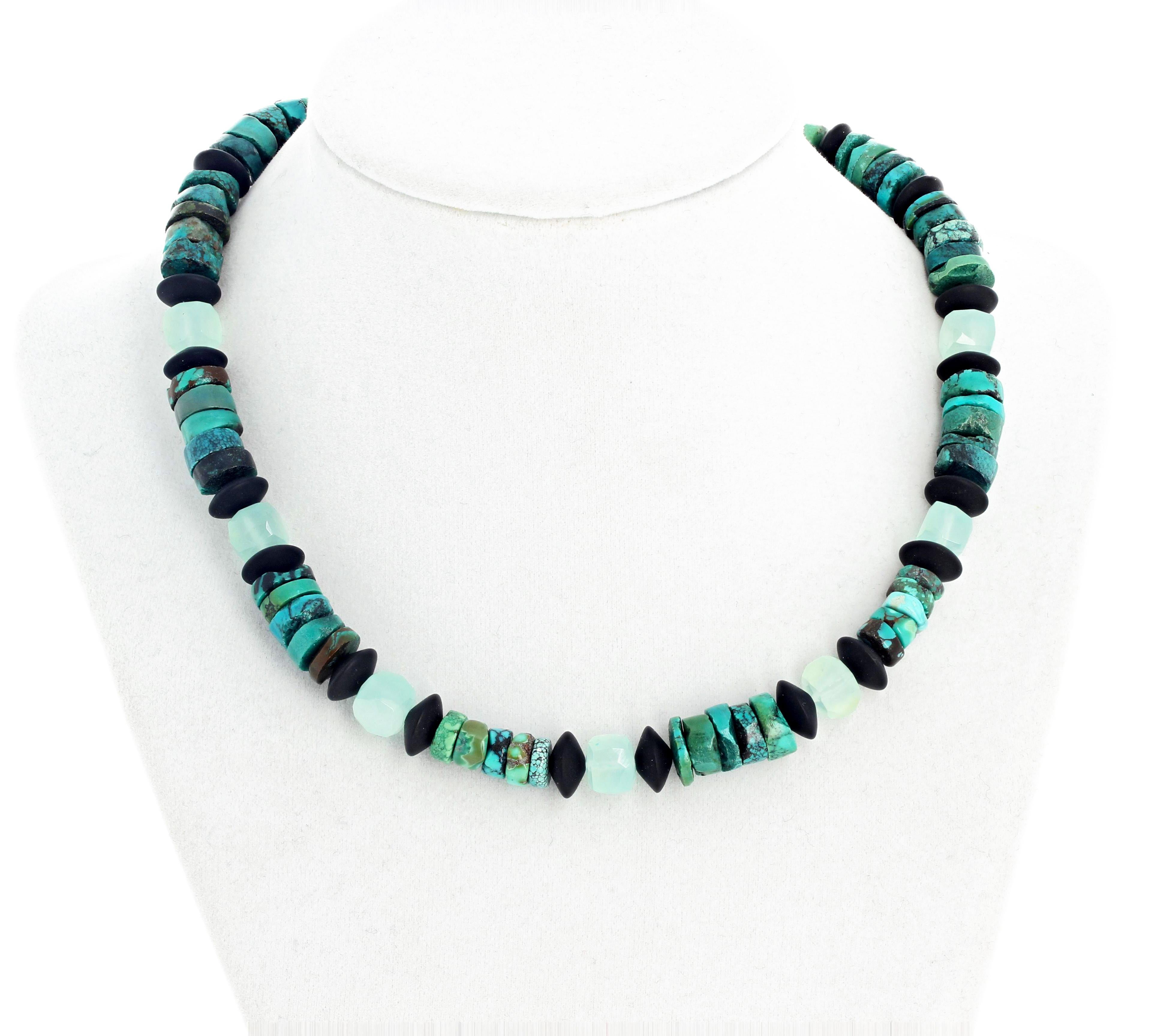 Glowing delicate beautiful Mexican Turquoise (10 mm approximately) polished slices enhanced with Black Onyx and Blue Quartz necklace.  This handmade necklace is 16 inches long with a hook clasp.  