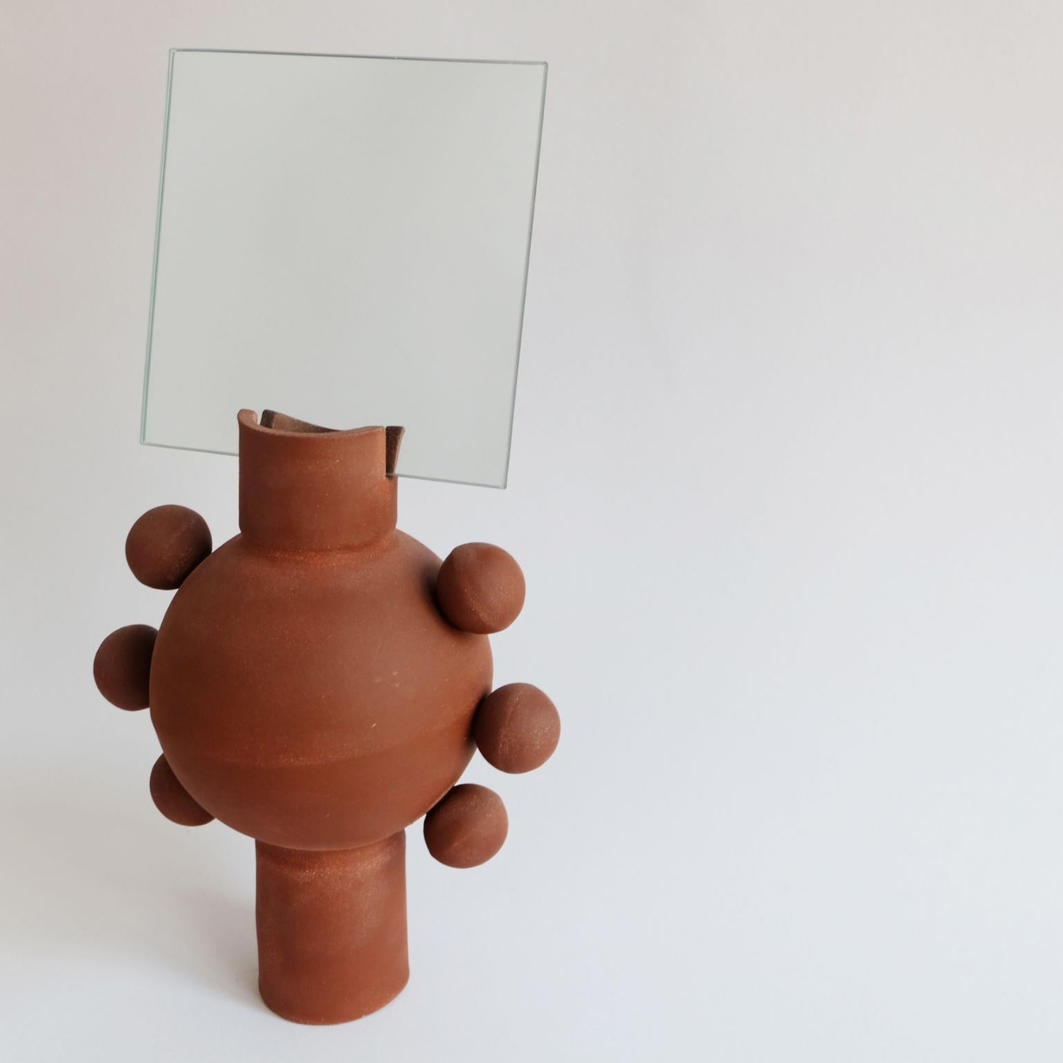 Unique UFO mirror by Ia Kutateladze
Dimensions: W 19 x H 38 cm
Materials: Clay
UFO 01 is a hand built ceramic mirror. Playful and bold functional decorative object, for various types of interiors.
IAAI / Ia Kutateladze is a Georgian