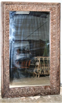 Unique Unmatched Mirror Using Highly Carved Window Frame of a Colonial Era Home.