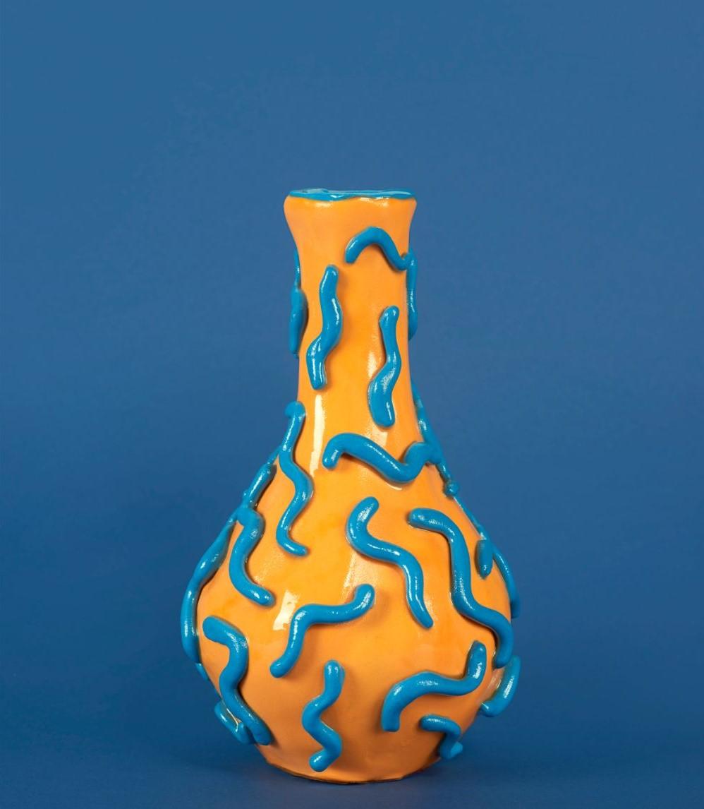 Unique vase Made in 89 minutes by Minute Manufacturing
Dimensions: D 18 x H 20 cm
Materials: Waste materials
 Such as Cardboard Tubes, Plastic Boxes, Leather, Clay

Minute Manufacturing is a production system that makes objects by the minute.